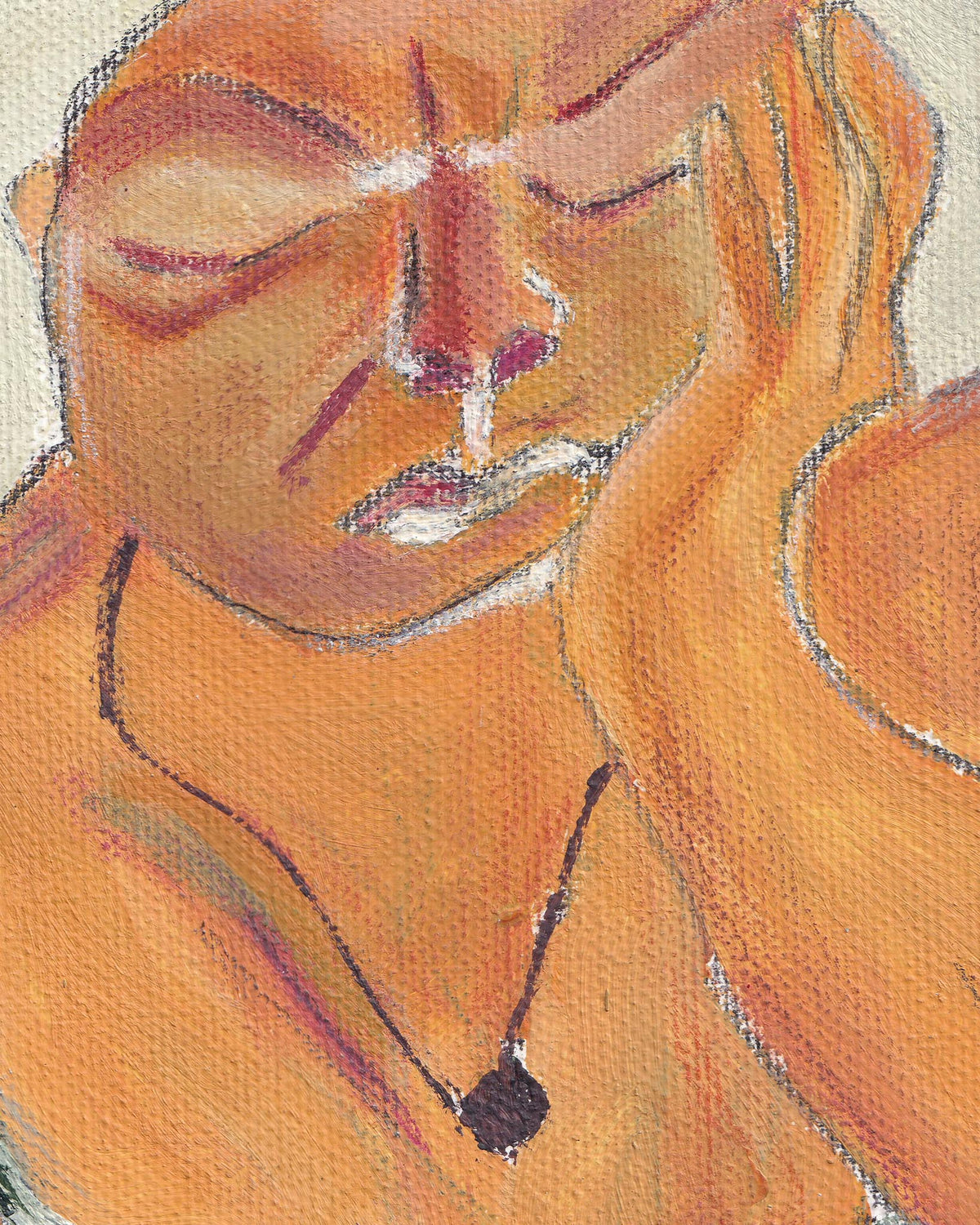 Close-up of a person wearing a necklace with a pendant on a textured beige background