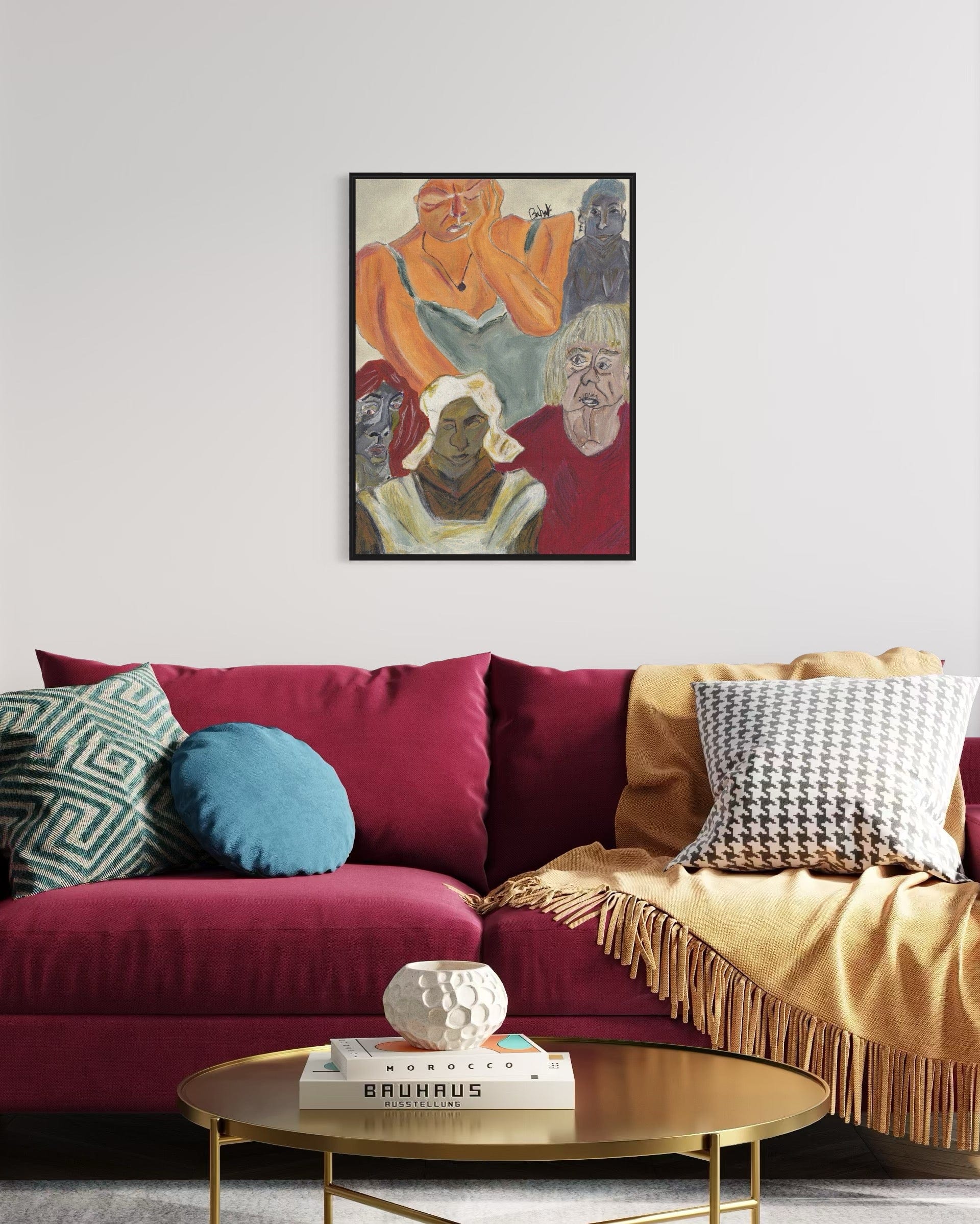 Colorful living room with a red sofa, gold coffee table, and wall art.