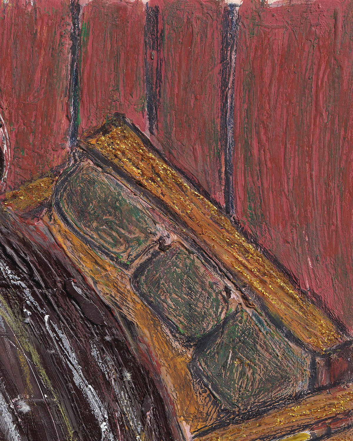 Close-up of a textured surface with a prominent rectangular object, possibly a book or box, against a red background.