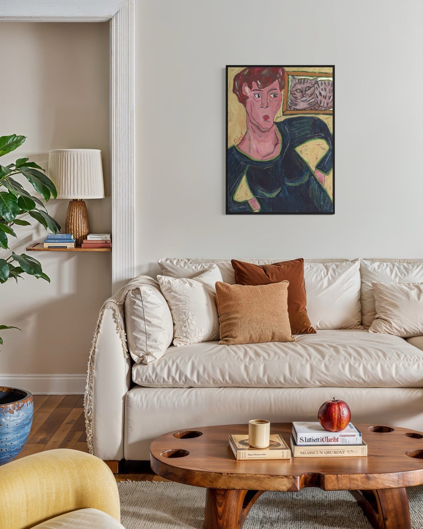 Living room with a beige sofa, wooden coffee table, and colorful painting on the wall.