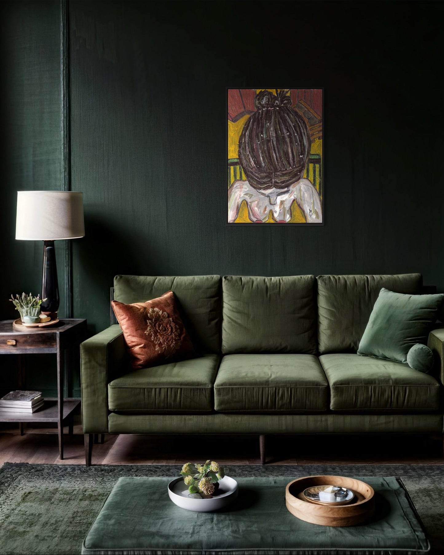Green sofa in a living room with a dark wall, lamp, and decorative items.