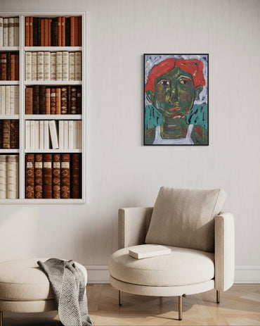 Modern living room with a bookshelf, armchair, and wall art.
