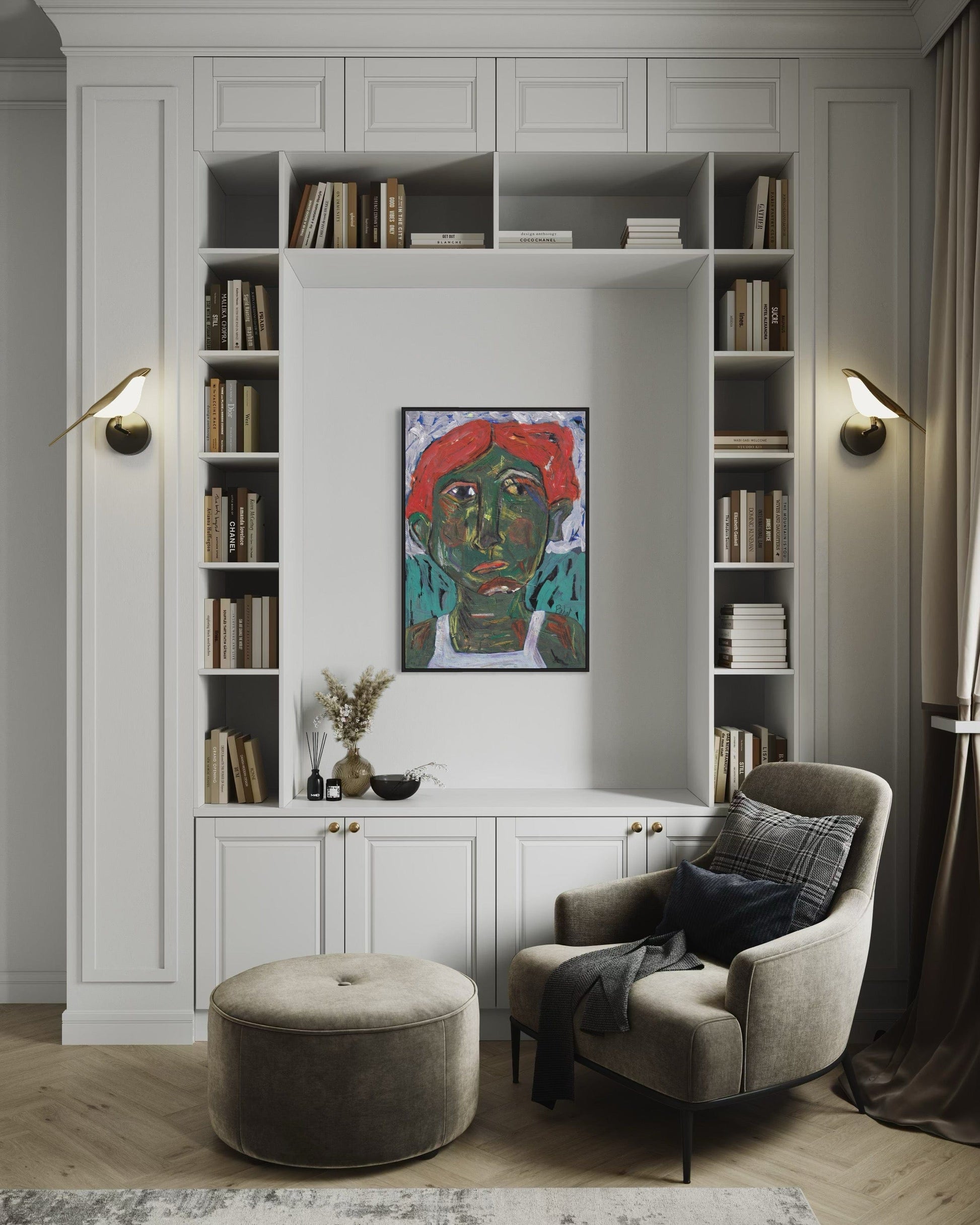 Modern living room with bookshelves, armchair, ottoman, and artwork.