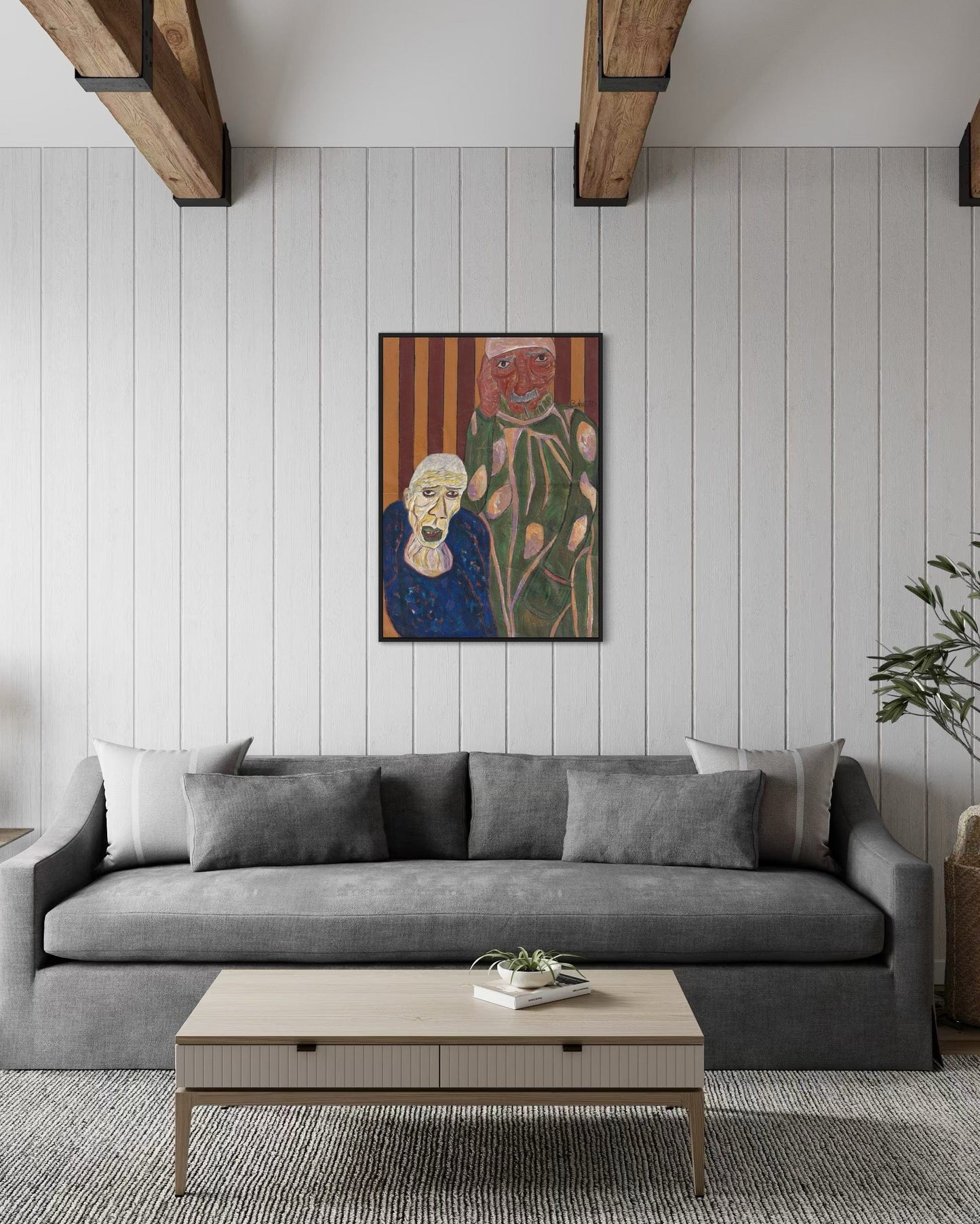 Living room with a gray sofa, wooden coffee table, and abstract painting on the wall.