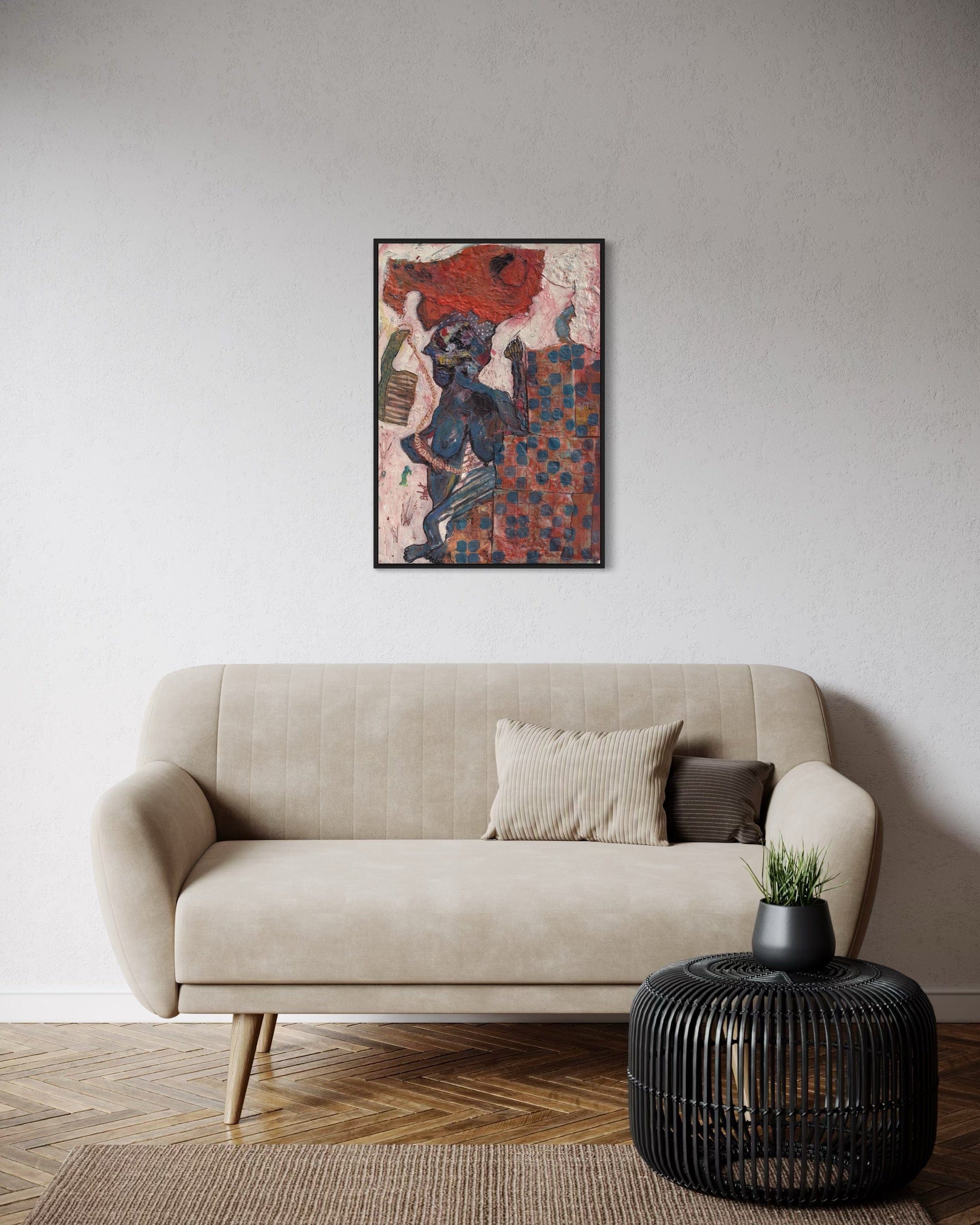 Beige sofa with decorative pillows in a living room setting, featuring a colorful abstract painting on the wall.