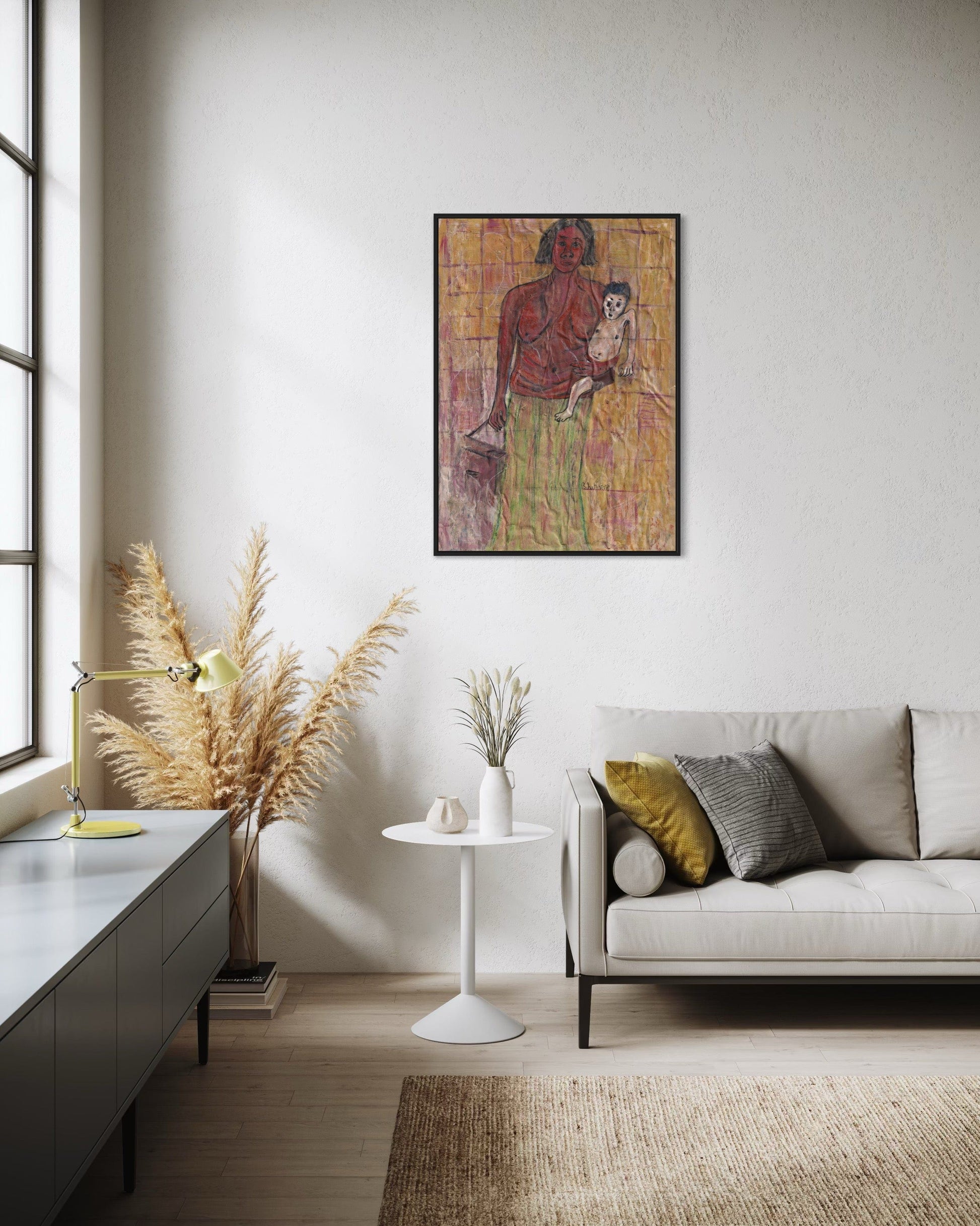 Living room with a painting on the wall, a sofa, and decorative elements.