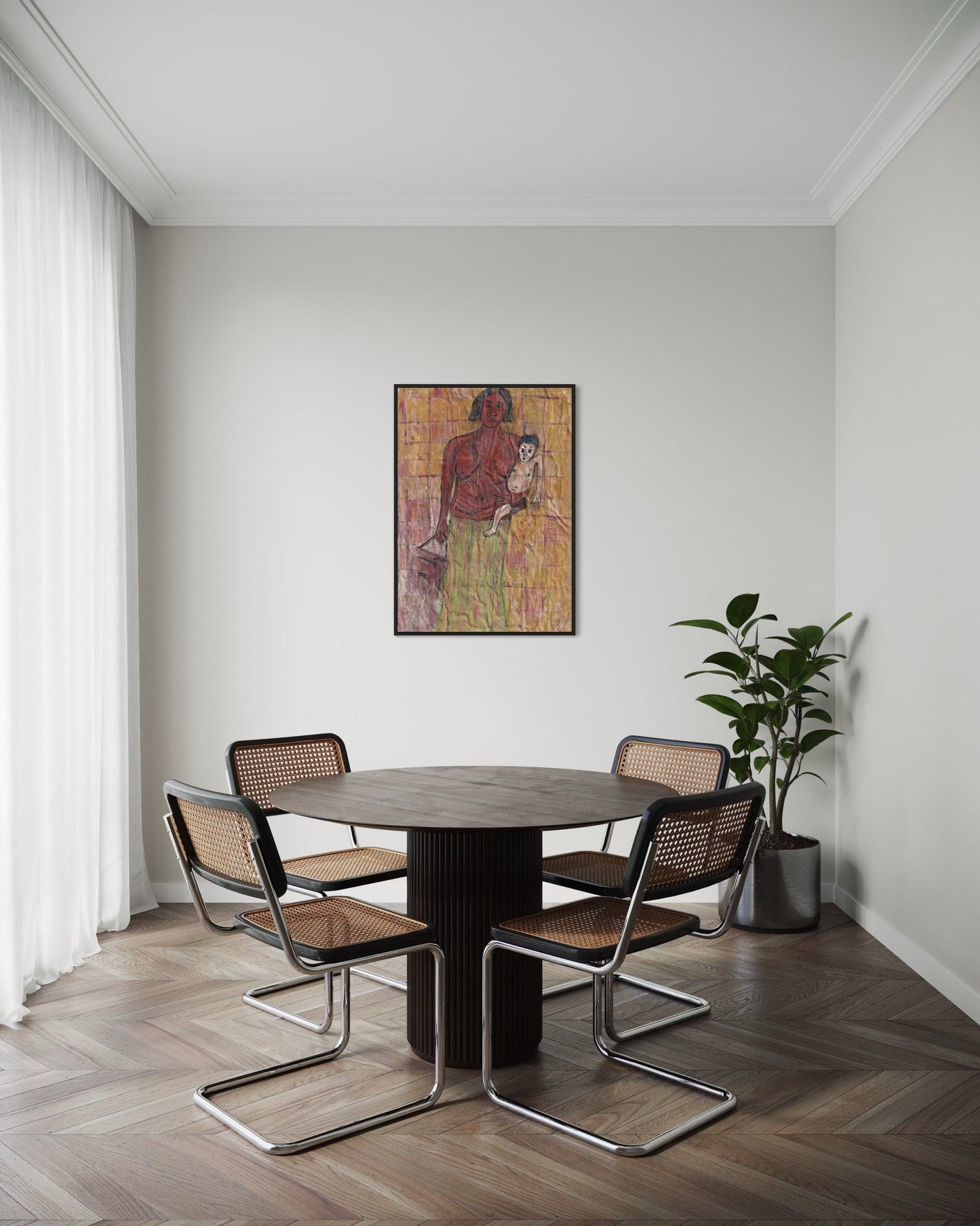 Dining area with round table and four chairs in a room with a painting on the wall.