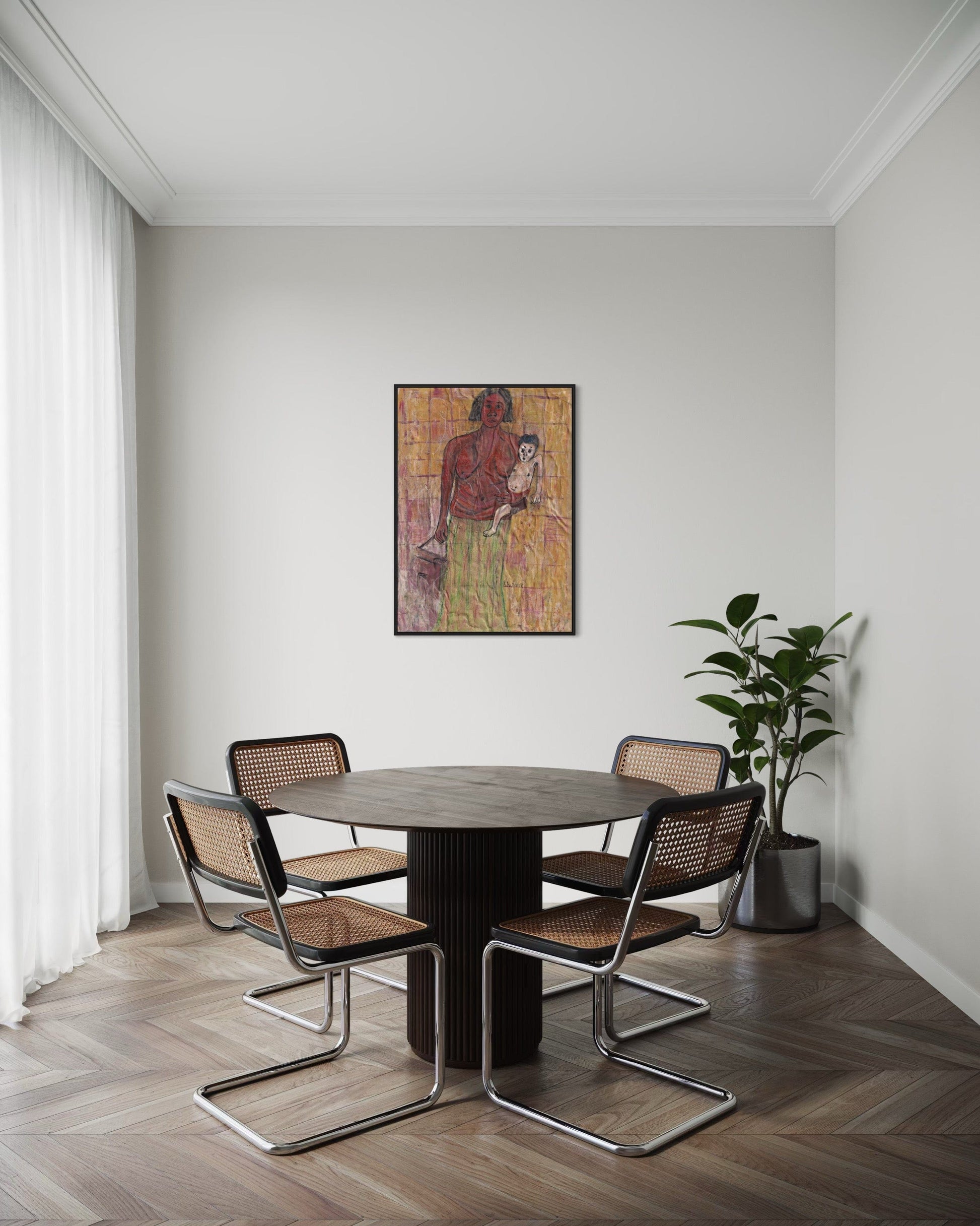 Dining area with round table and four chairs in a room with a painting on the wall.