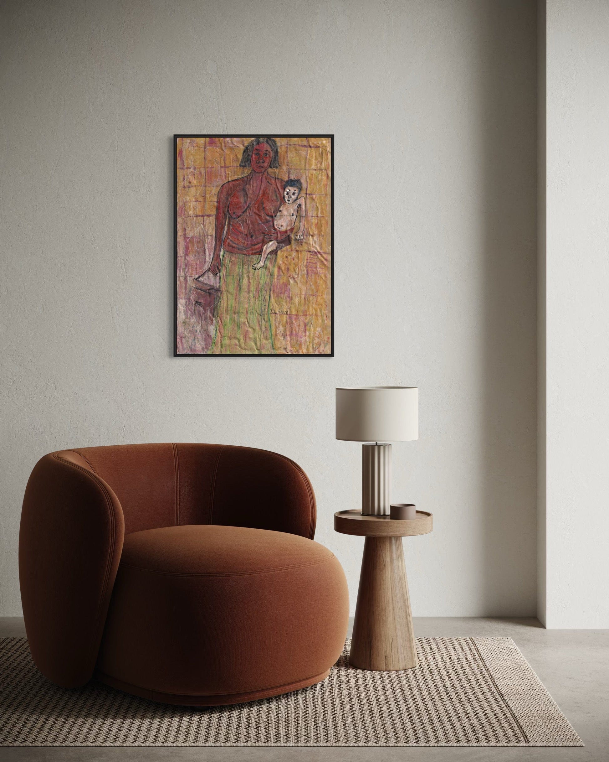 Brown armchair in a room with a lamp and a colorful painting on the wall.