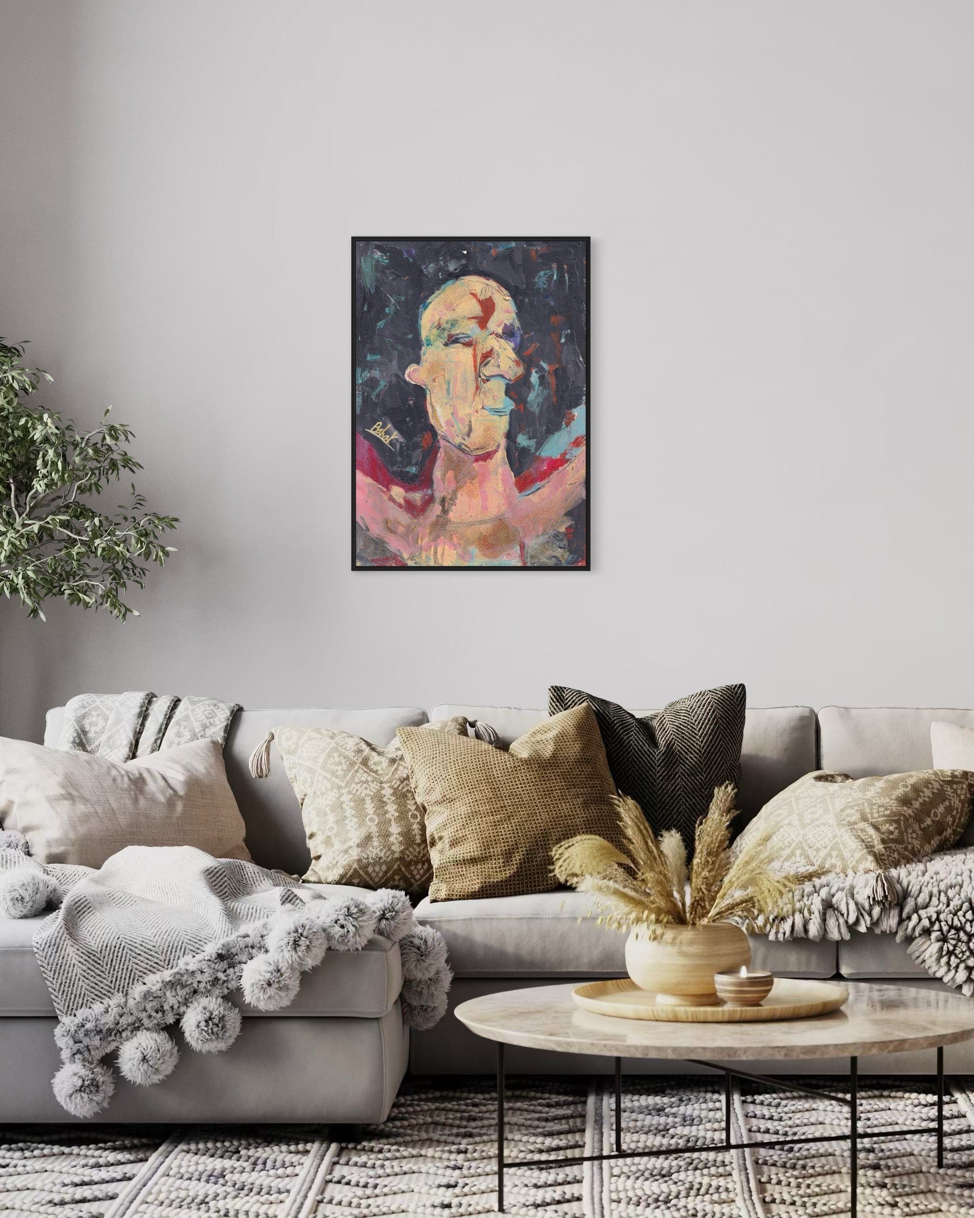 Living room with a gray sofa, decorative pillows, and a framed abstract painting on the wall.