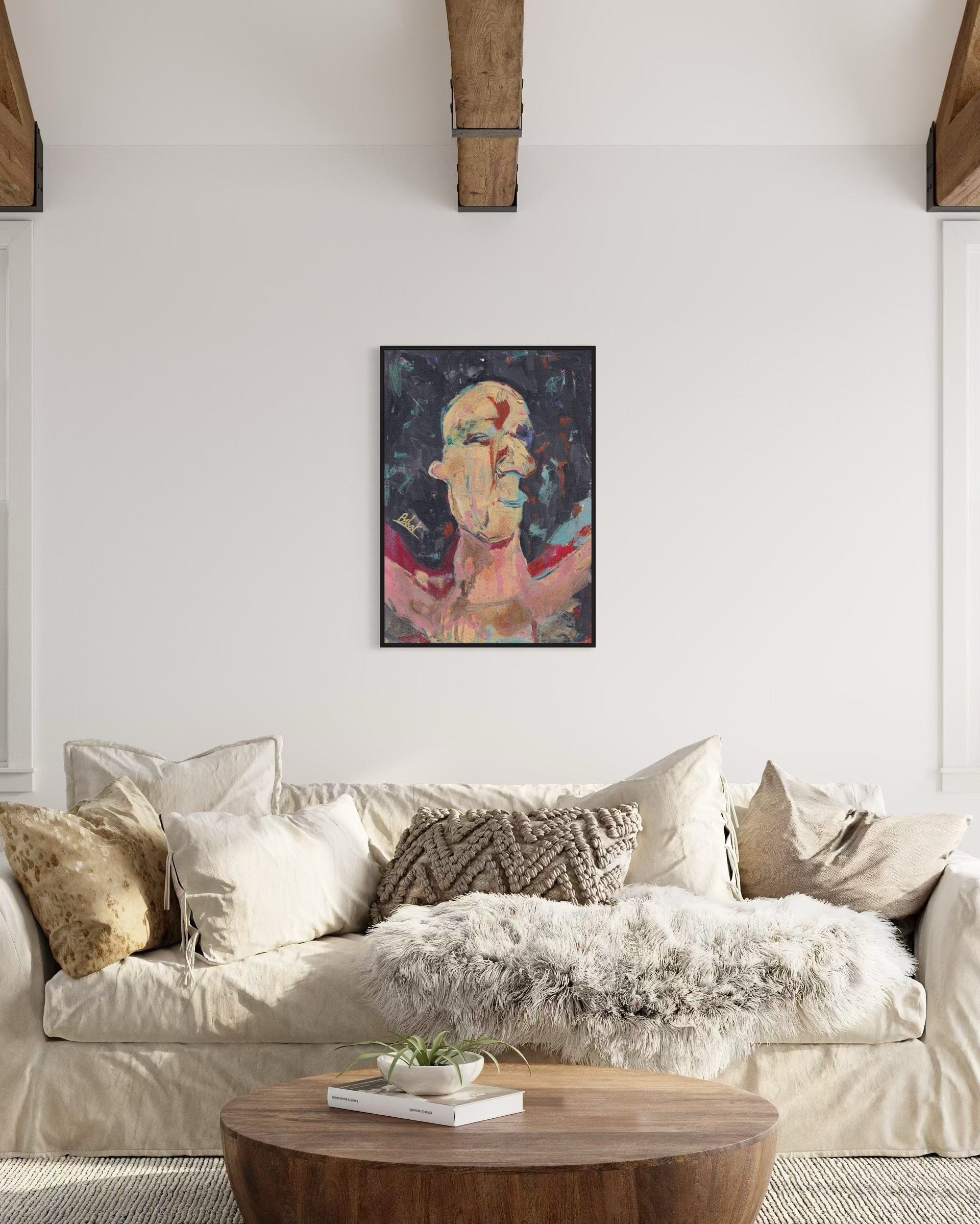 Living room with a beige sofa, wooden coffee table, and abstract painting on the wall.