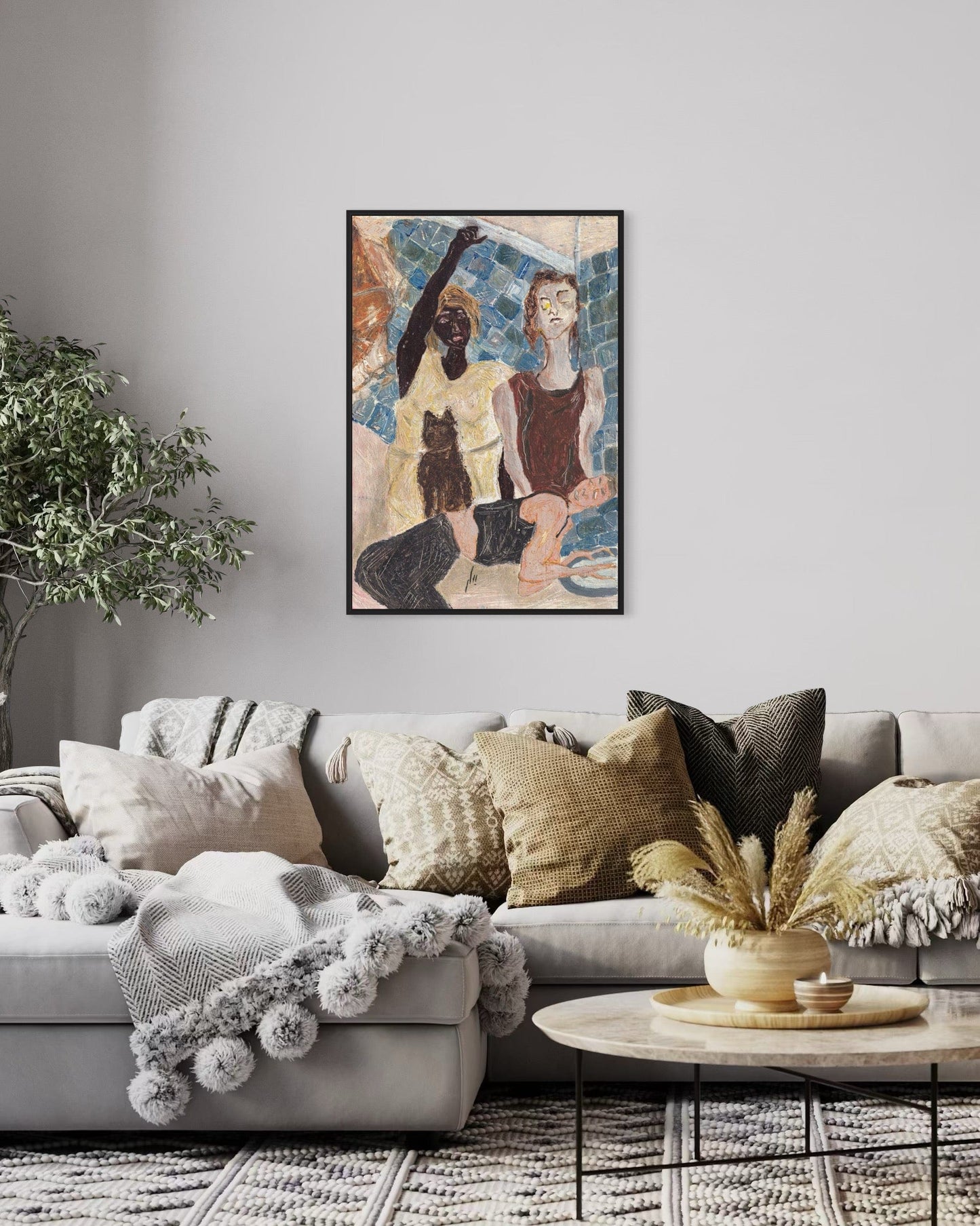 Living room with a gray sofa, decorative pillows, and a framed artwork on the wall.