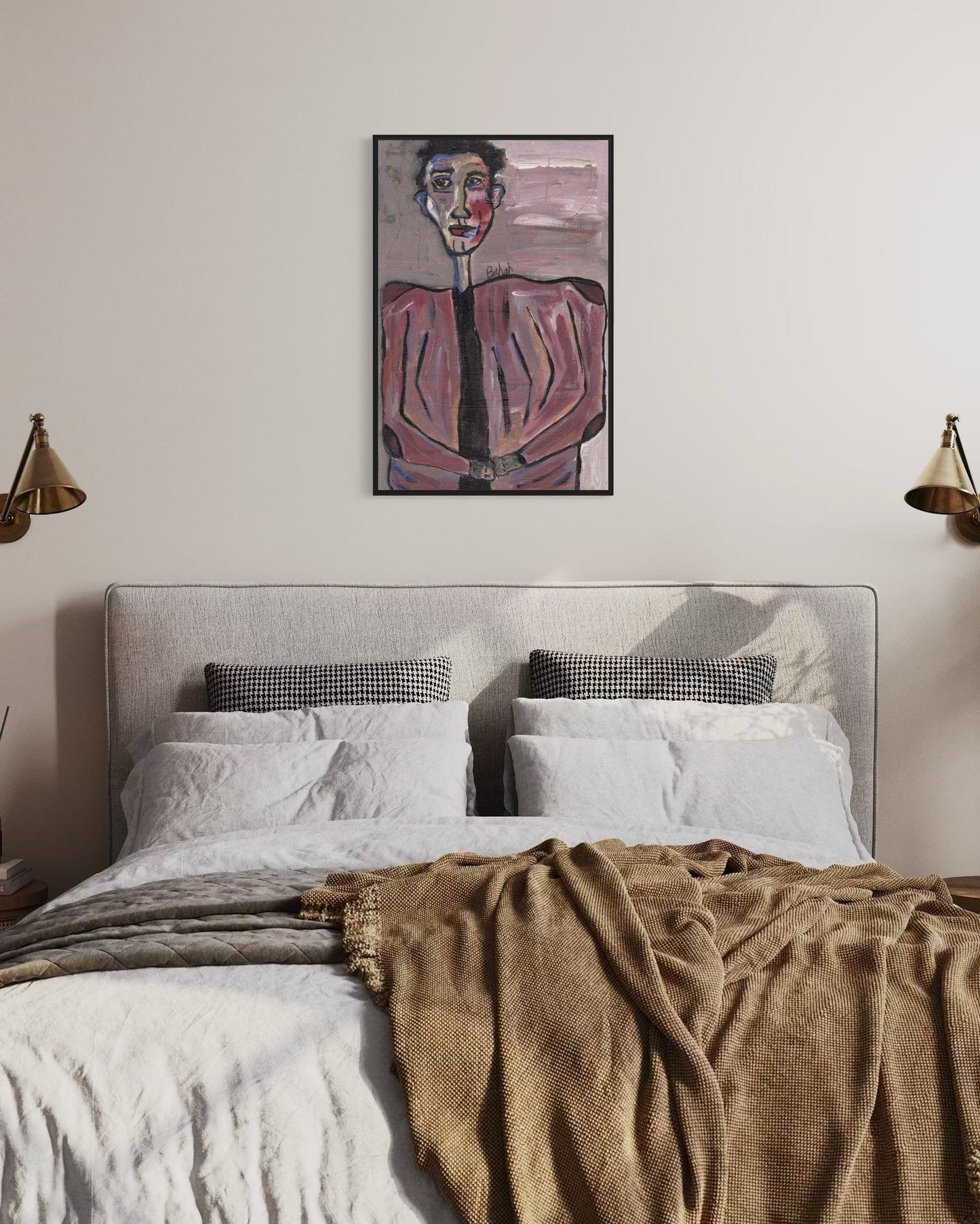 Bedroom with a bed, pillows, and a painting on the wall.