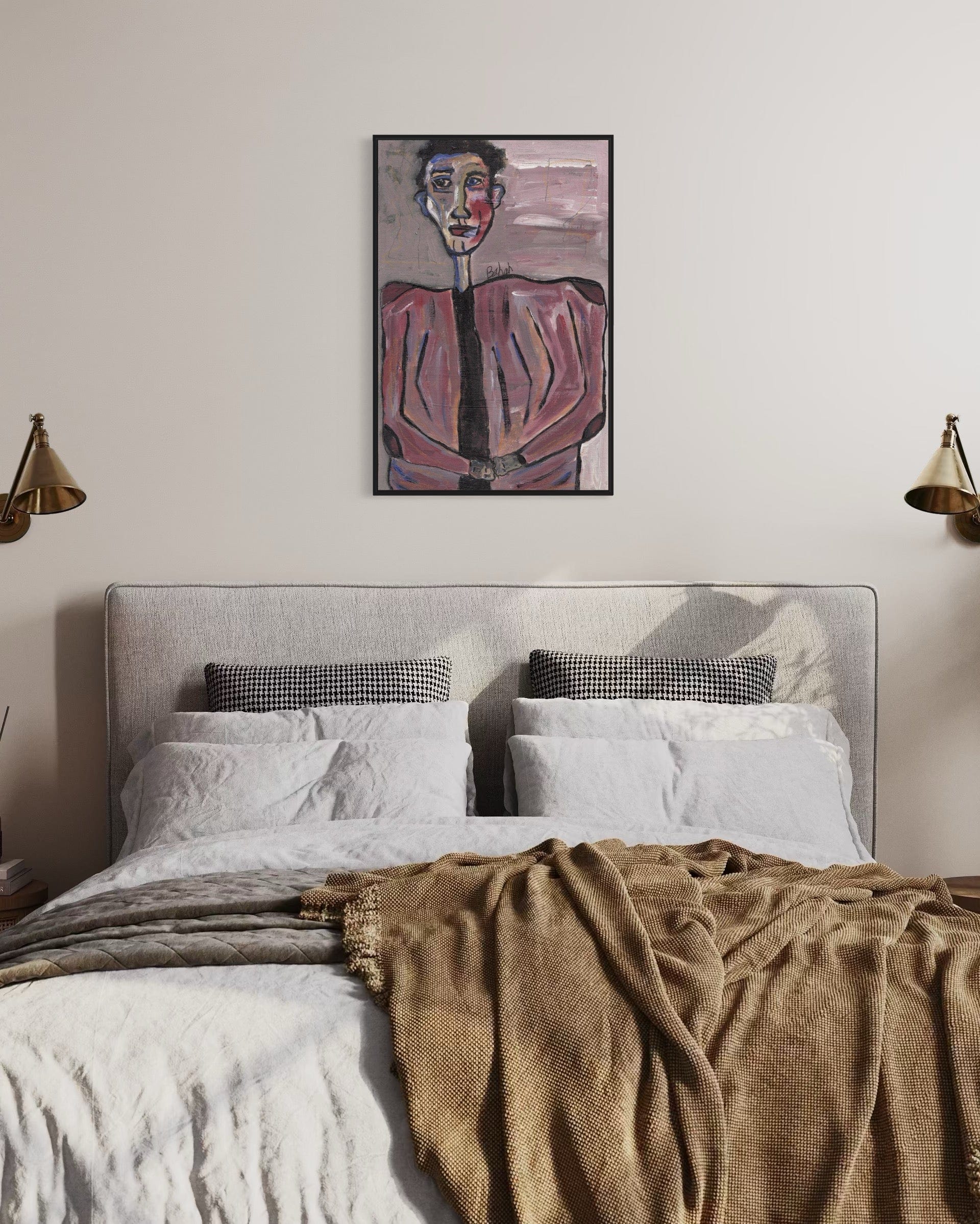 Bedroom with a bed, pillows, and a painting on the wall.