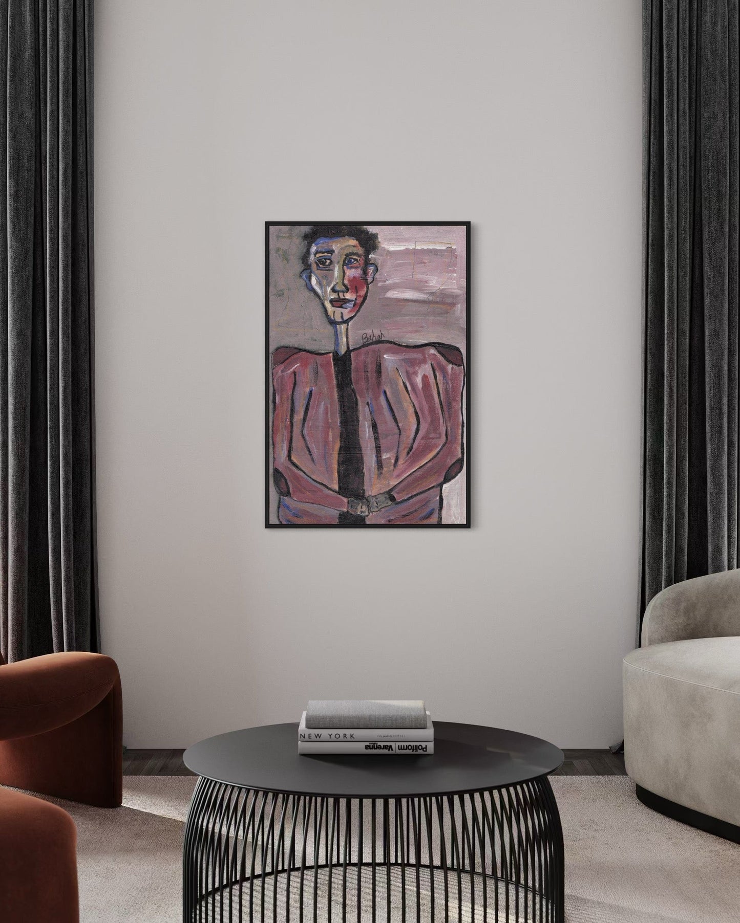 Artistic portrait on a wall above a modern black coffee table in a living room.
