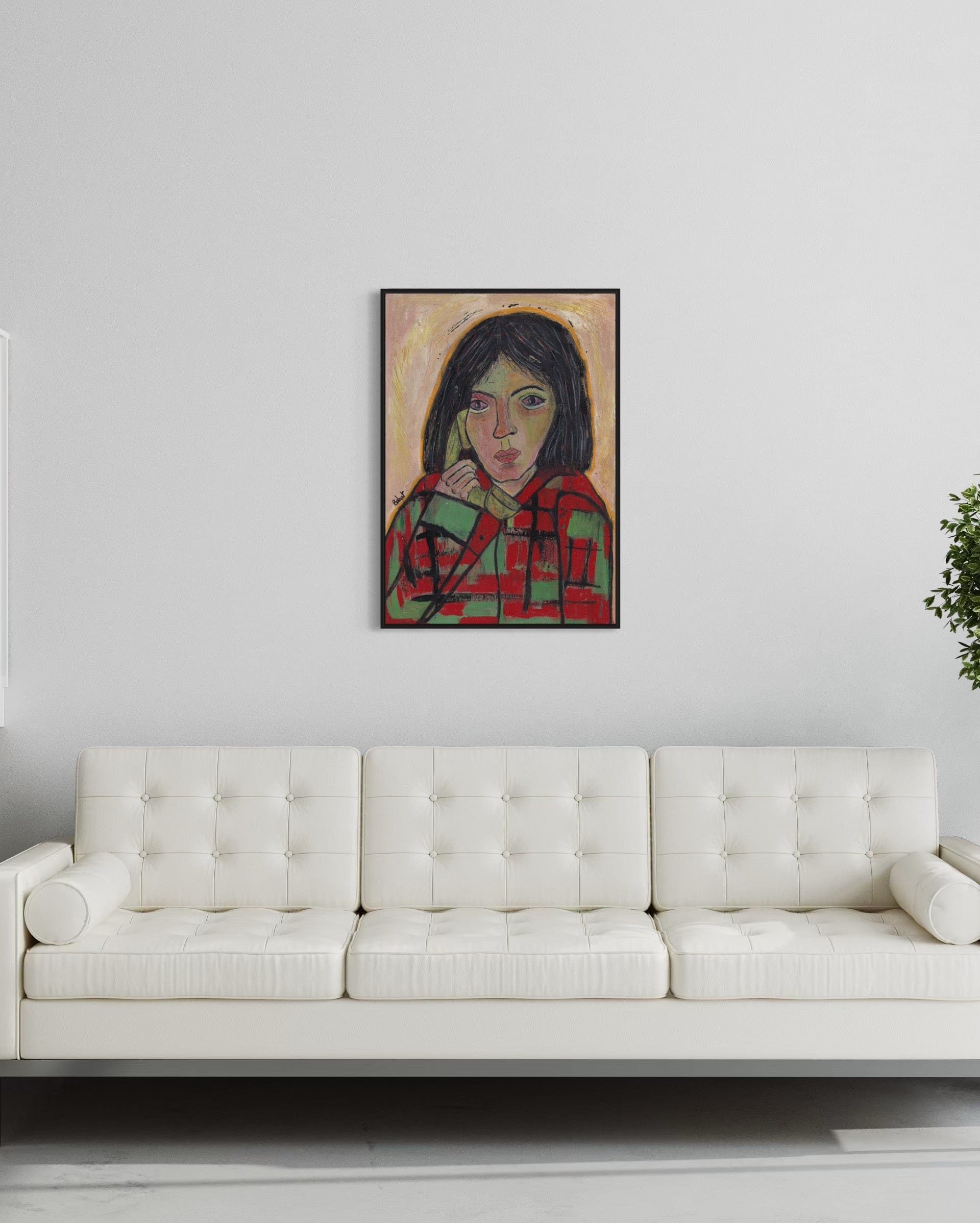 Painting of a woman in a checkered dress hanging above a white sofa.