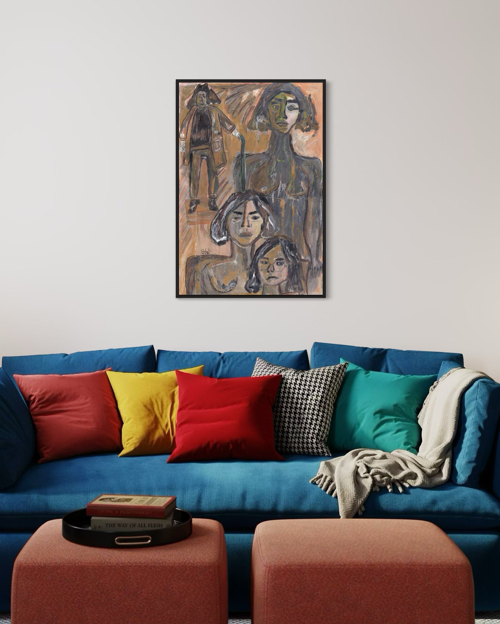 Colorful sofa with patterned cushions and a painting above in a living room.
