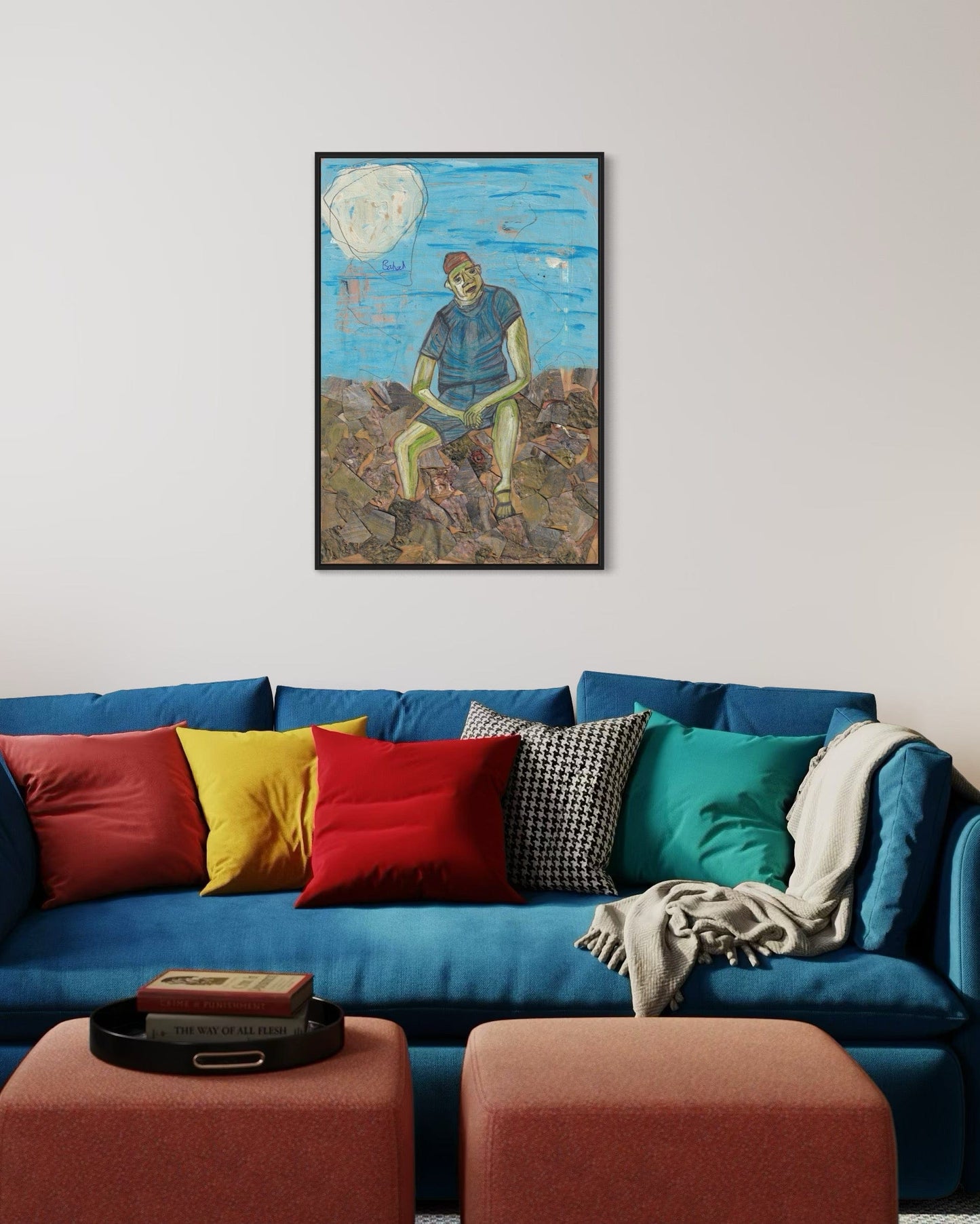 Colorful living room with a blue sofa, multicolored pillows, and a framed artwork on the wall.