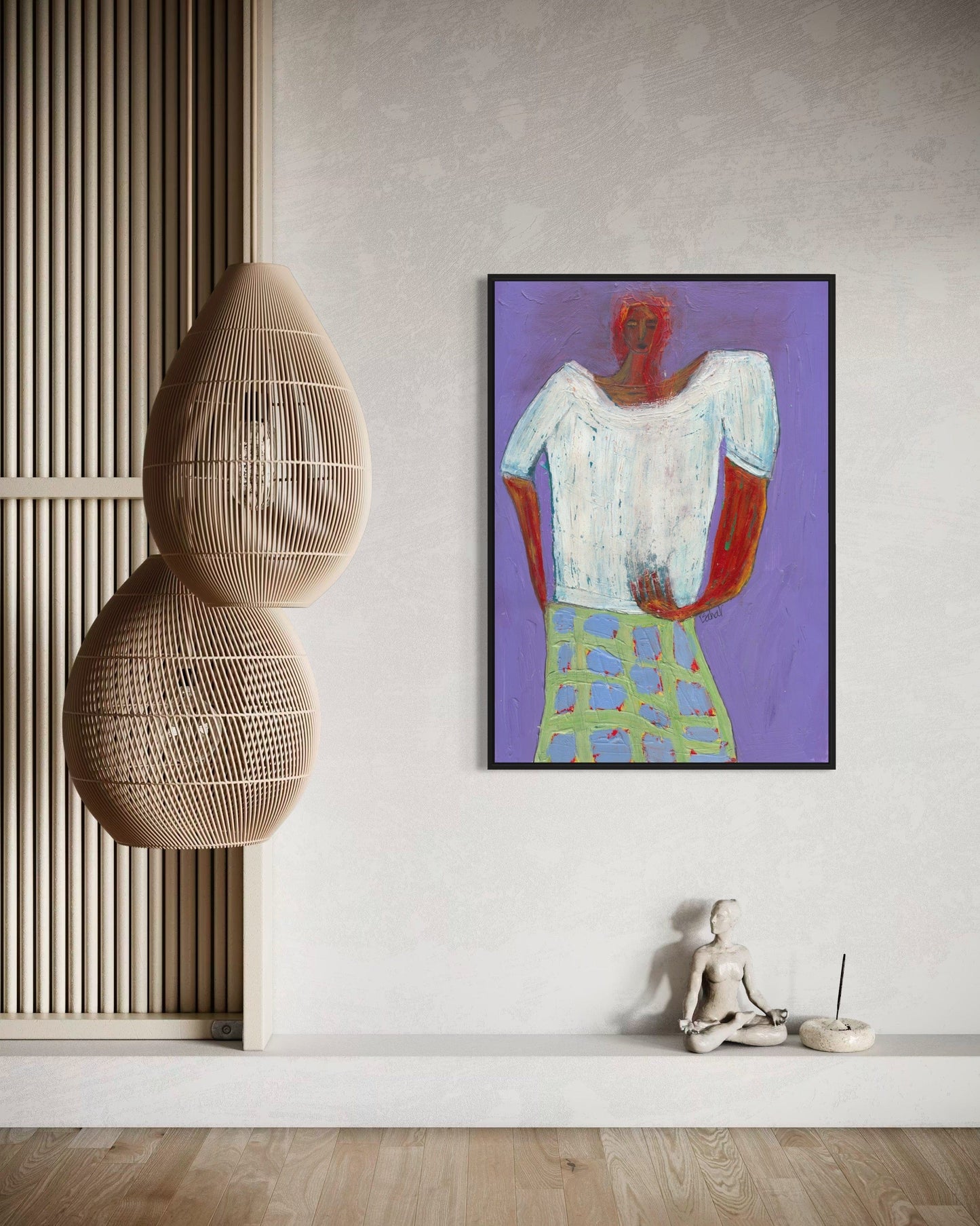 Modern interior with a colorful abstract painting of a person on a purple background, a woven chair, and a small statue.