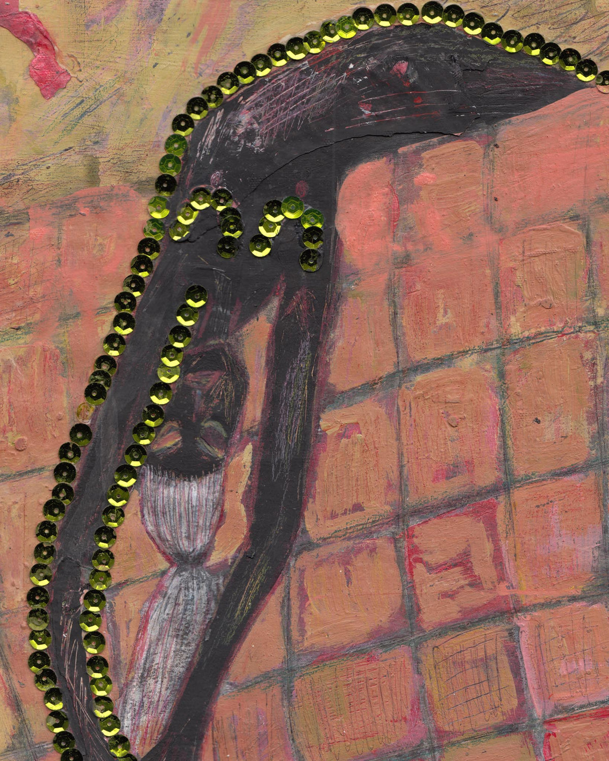 Decorative item with a black bow and green beads on a colorful textured background