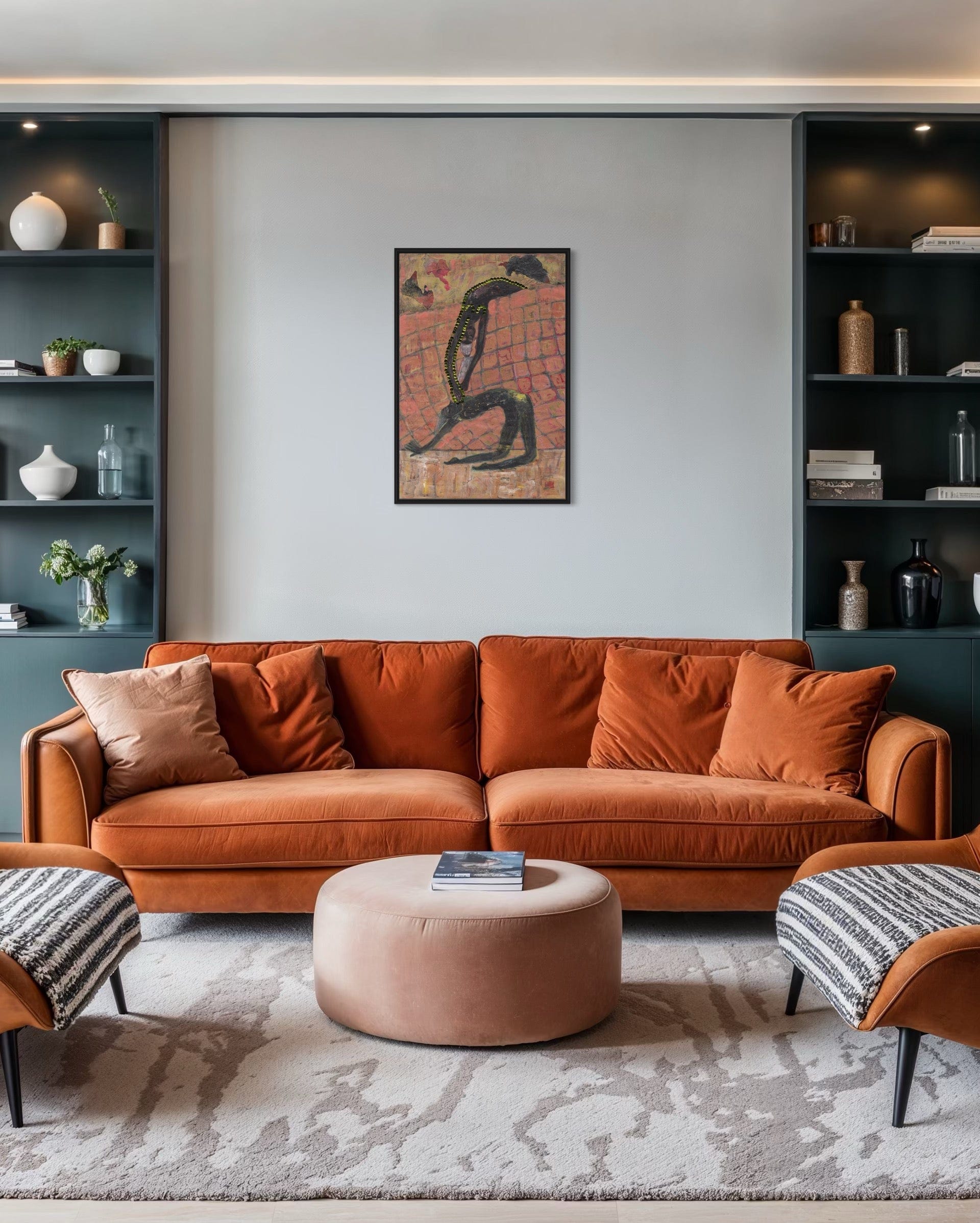 Modern living room with a brown sofa, ottoman, and decorative wall art.