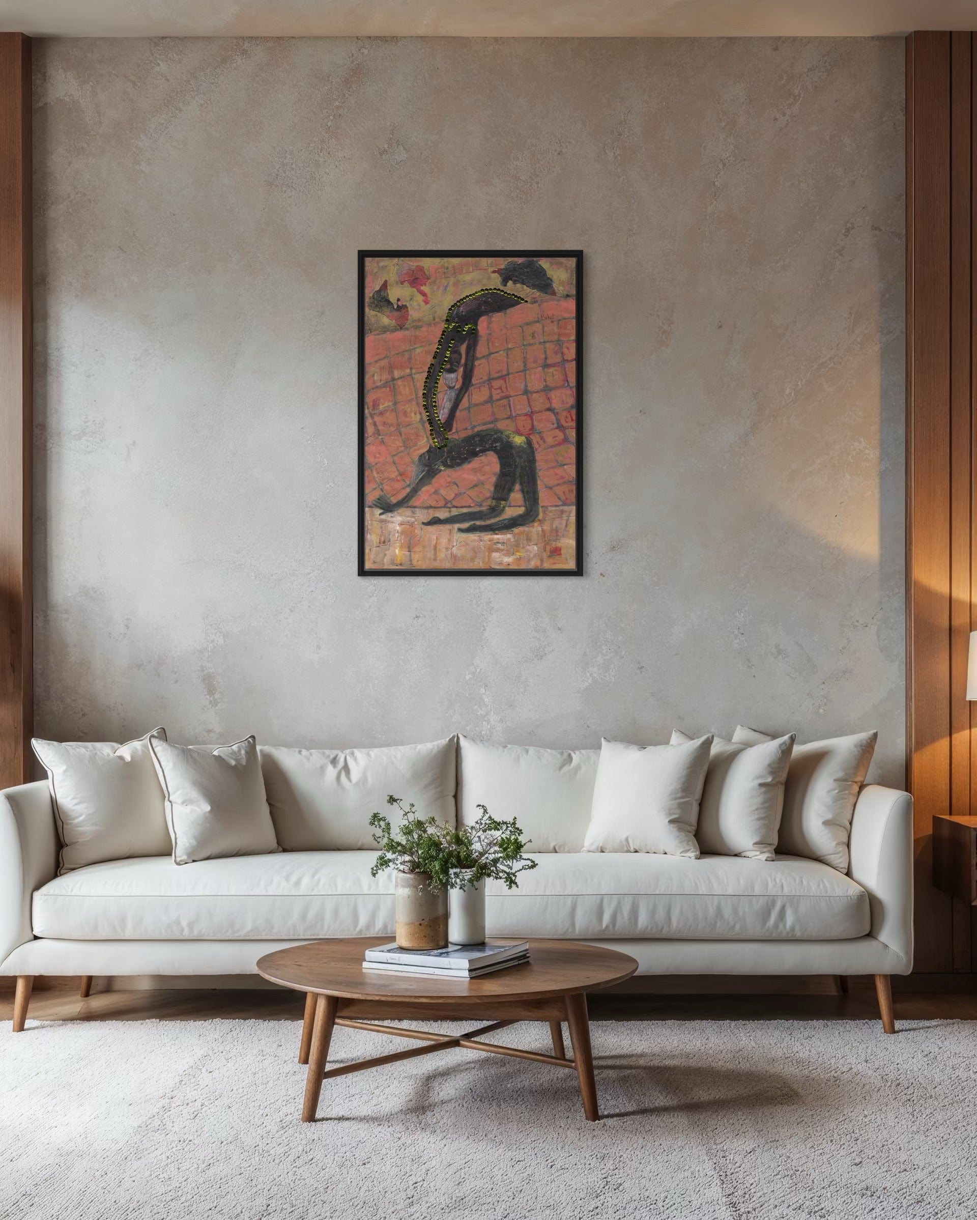 Living room with a white sofa, wooden coffee table, and abstract art on the wall.