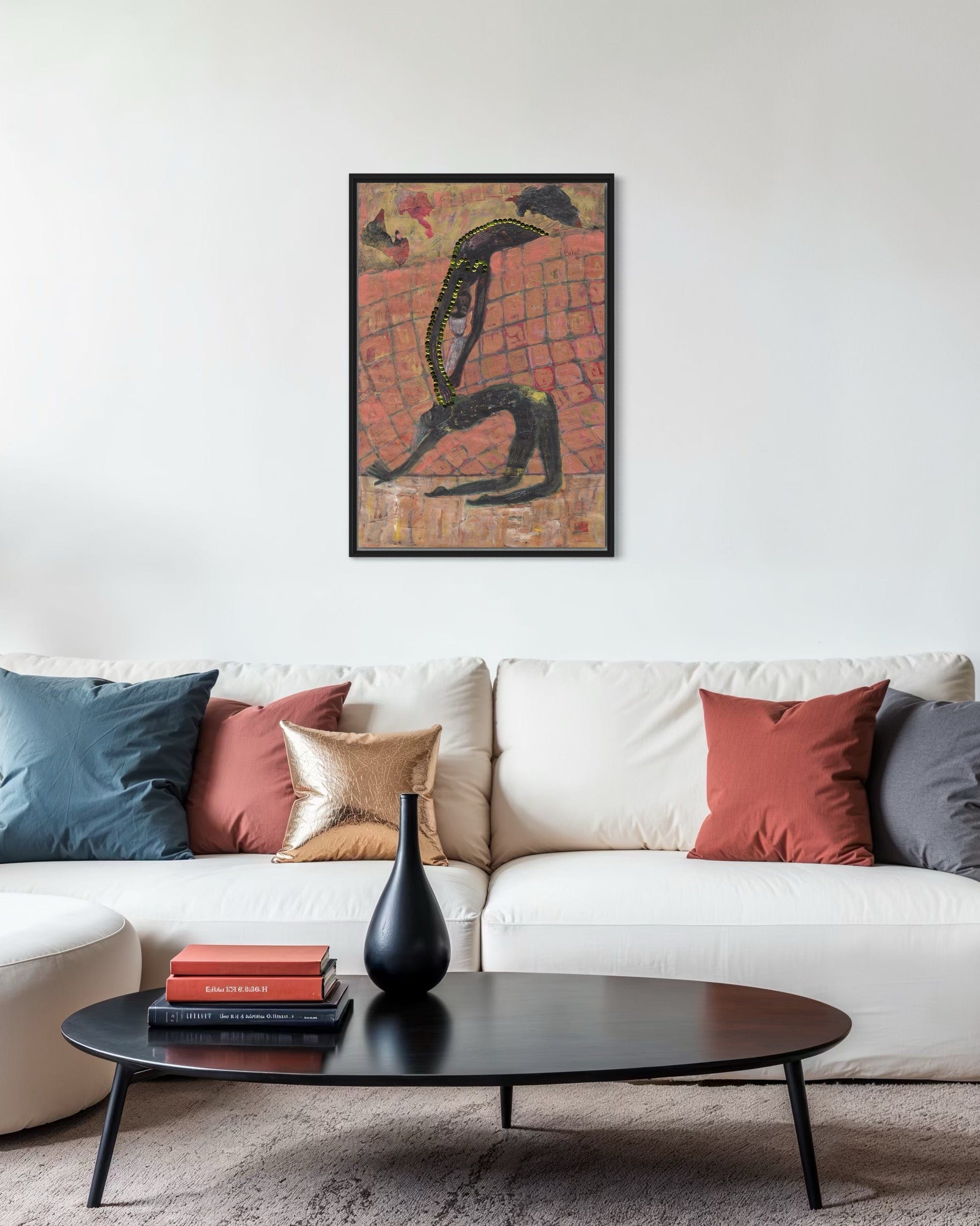 Living room with a white sofa, decorative pillows, a black coffee table, and a framed abstract painting on the wall.