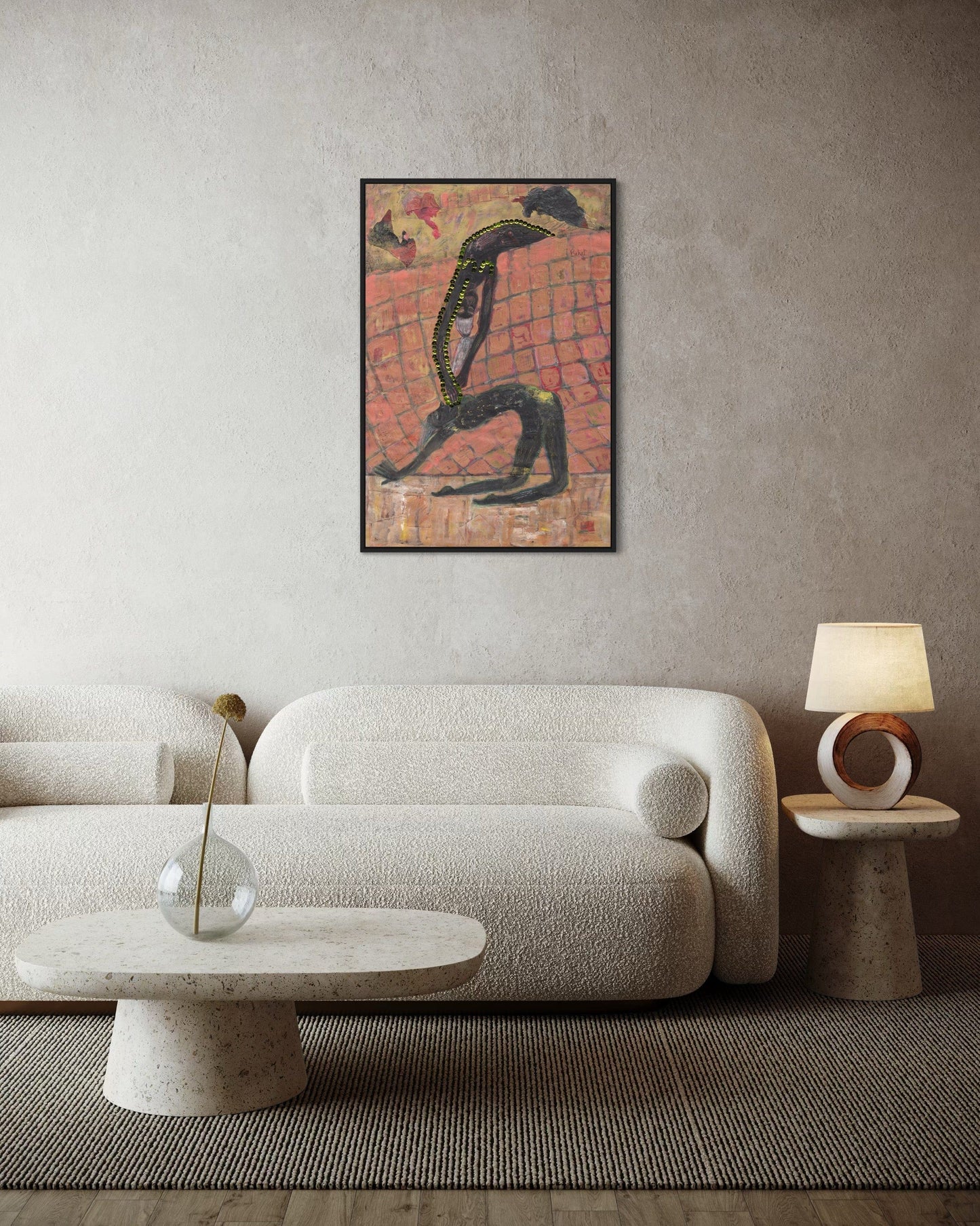 Modern living room with a textured sofa, side table, and abstract painting on the wall.
