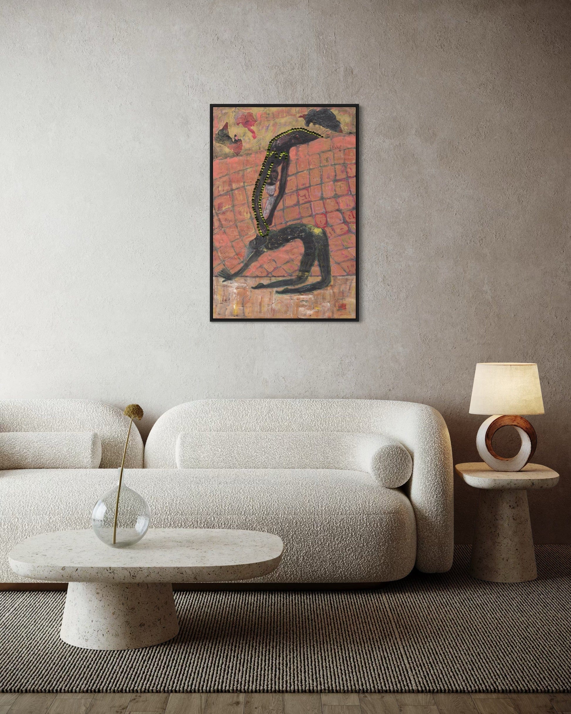 Modern living room with a textured sofa, side table, and abstract painting on the wall.