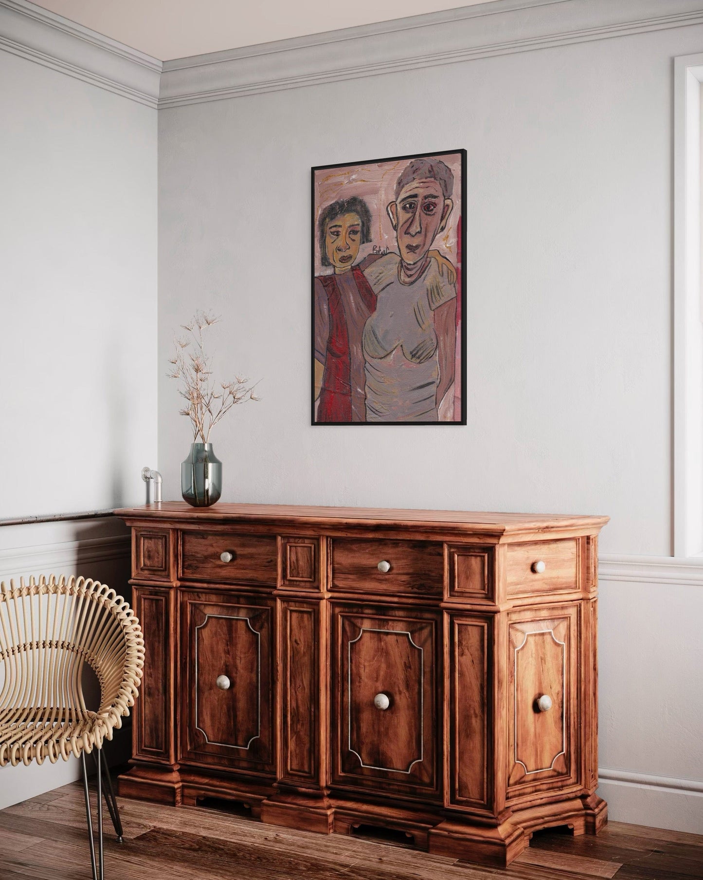 Wooden sideboard in a room with a painting on the wall