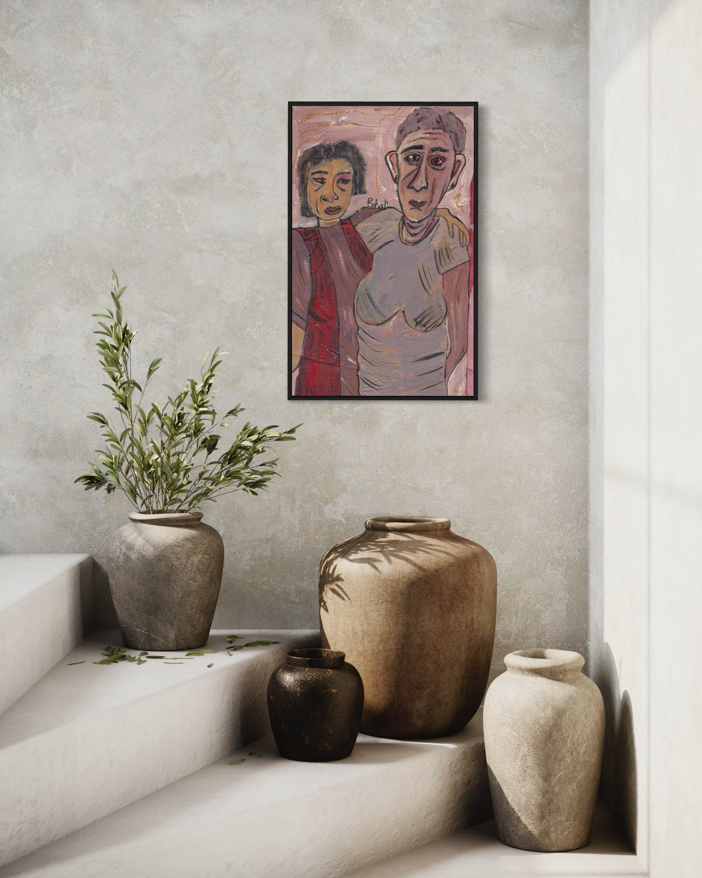 Decorative setting with vases and a plant on a shelf, featuring a framed artwork of two figures.