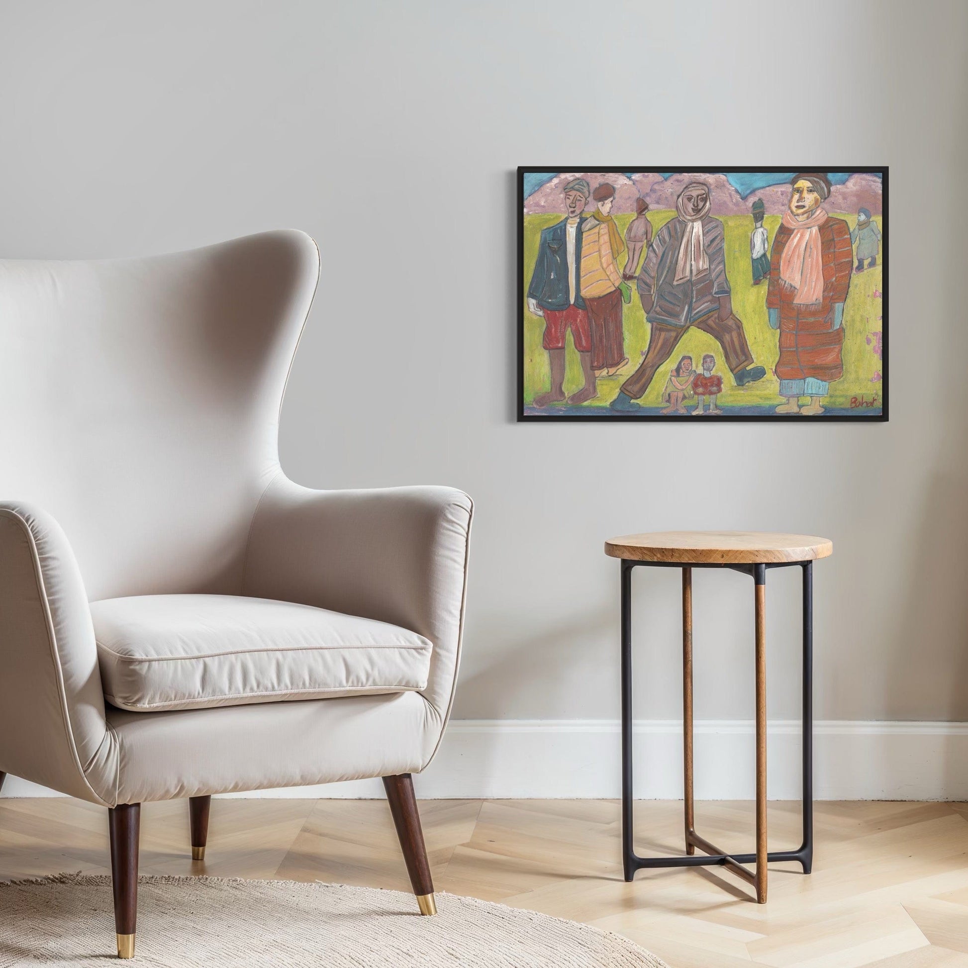 Modern armchair and side table in a room with a colorful painting on the wall.