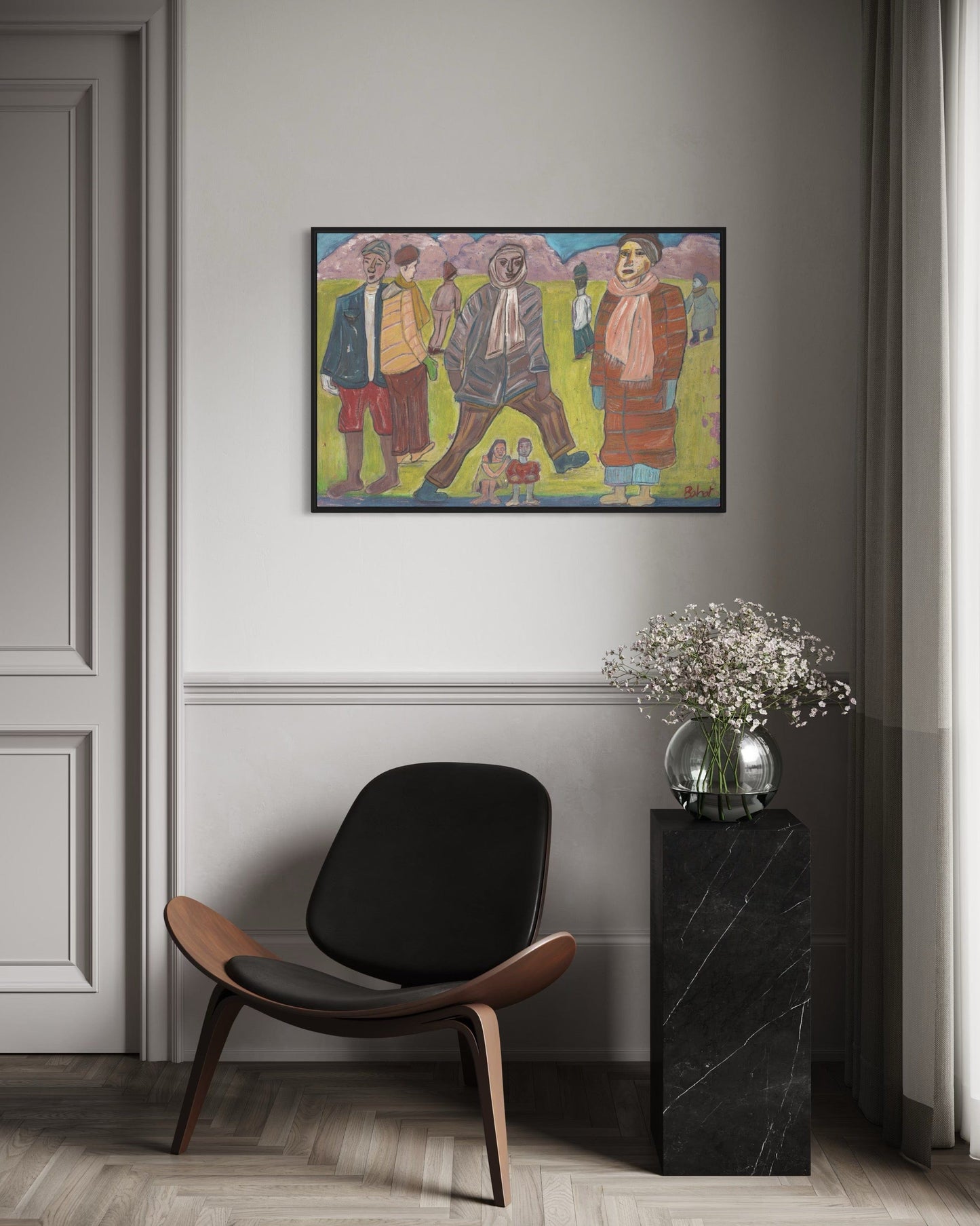 Modern interior with a black chair, side table, and colorful abstract painting on a gray wall.