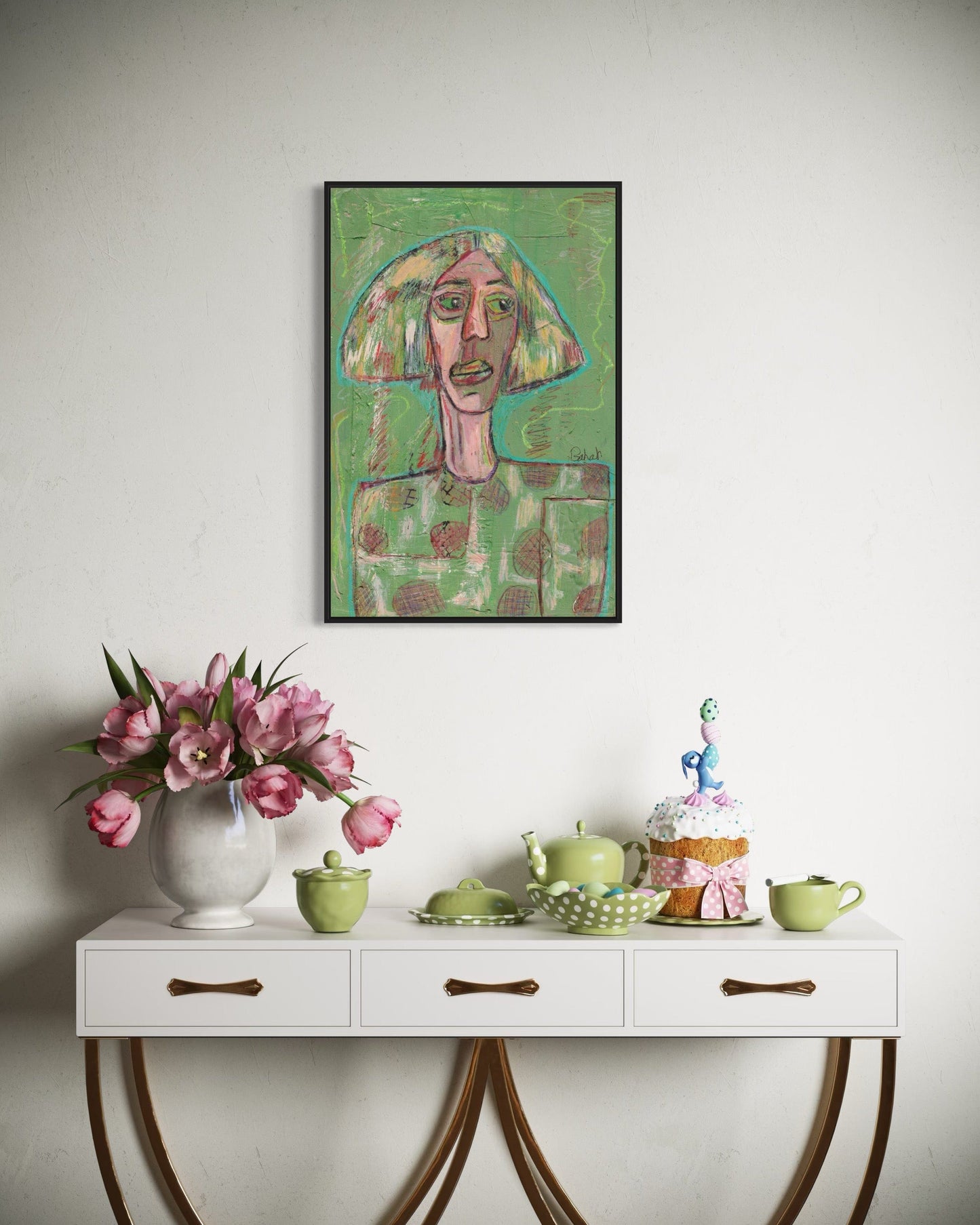 Decorative table with flowers, teacups, and a cake, featuring a framed painting on the wall.
