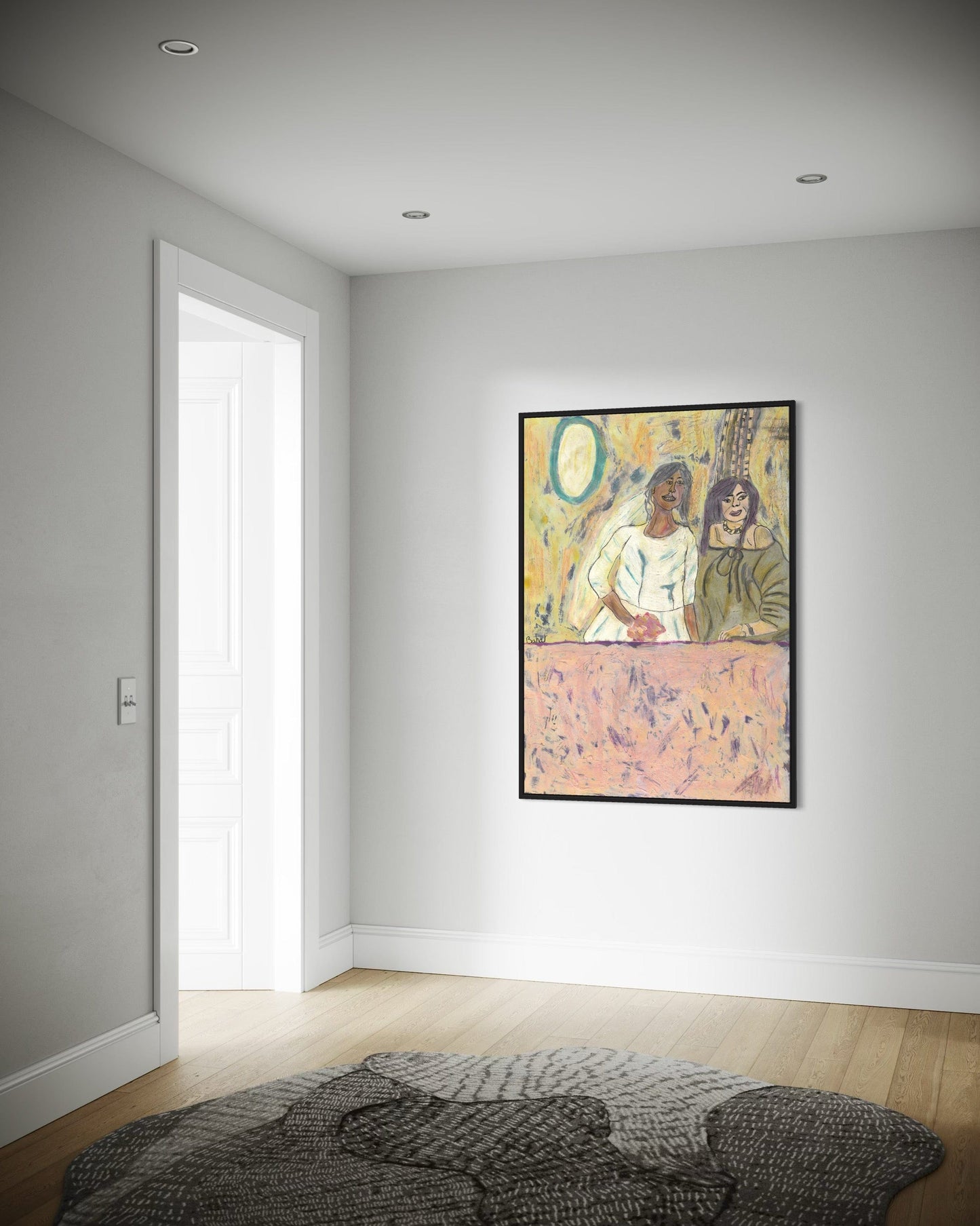 Framed artwork on a wall in a room with a door and rug.