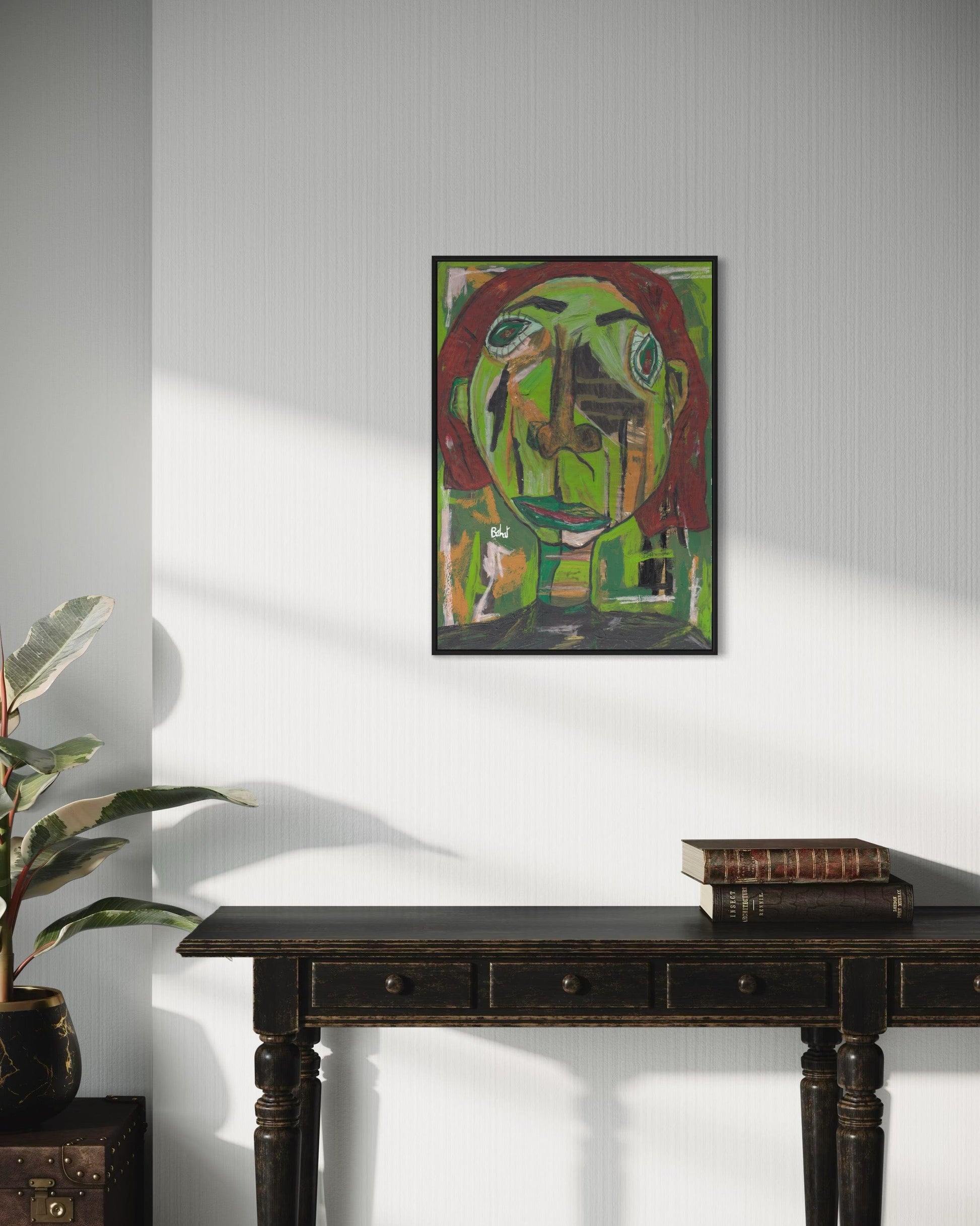 Framed abstract painting on a wall above a dark wooden console table.