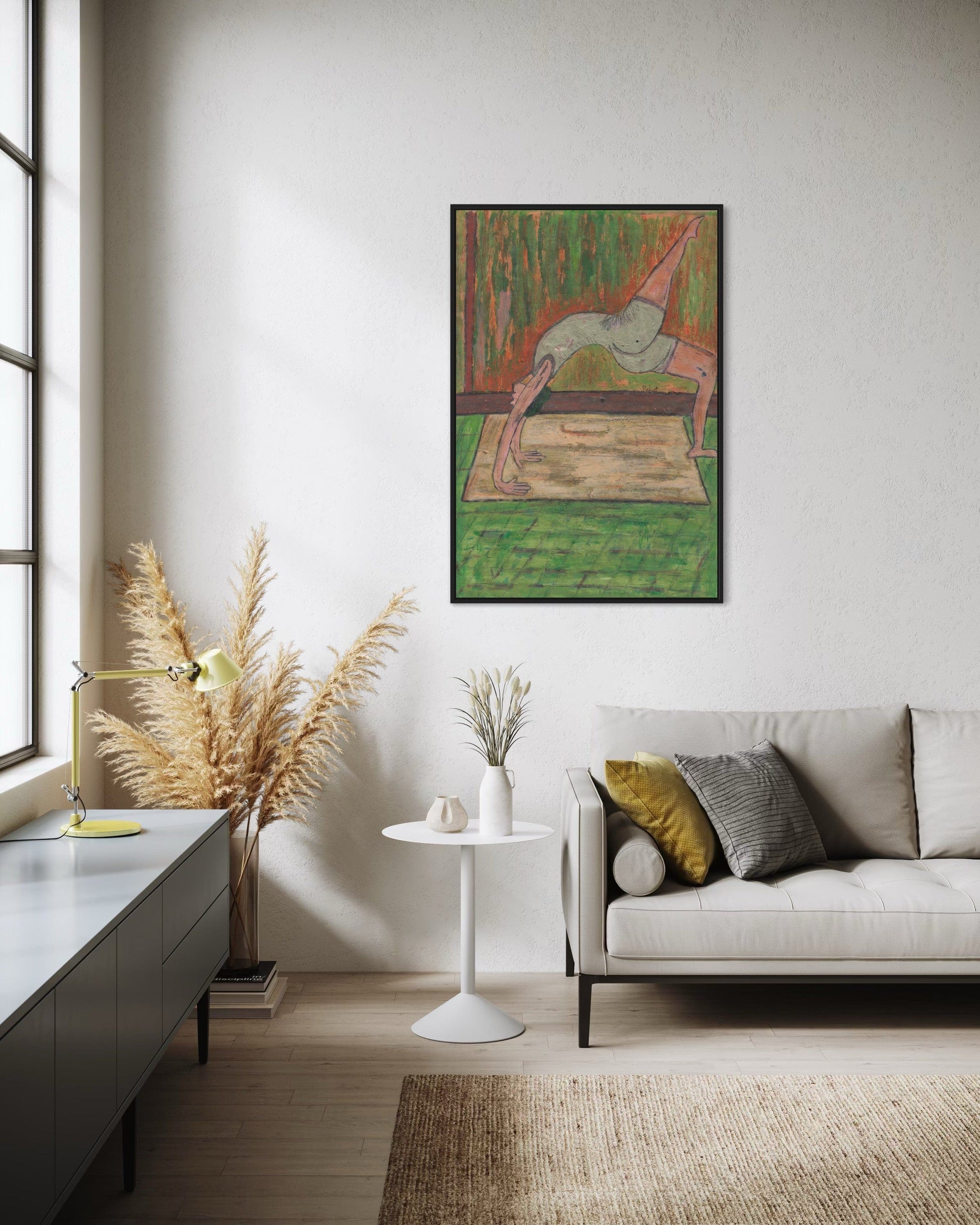 Living room with a painting on the wall, sofa, and decorative elements.