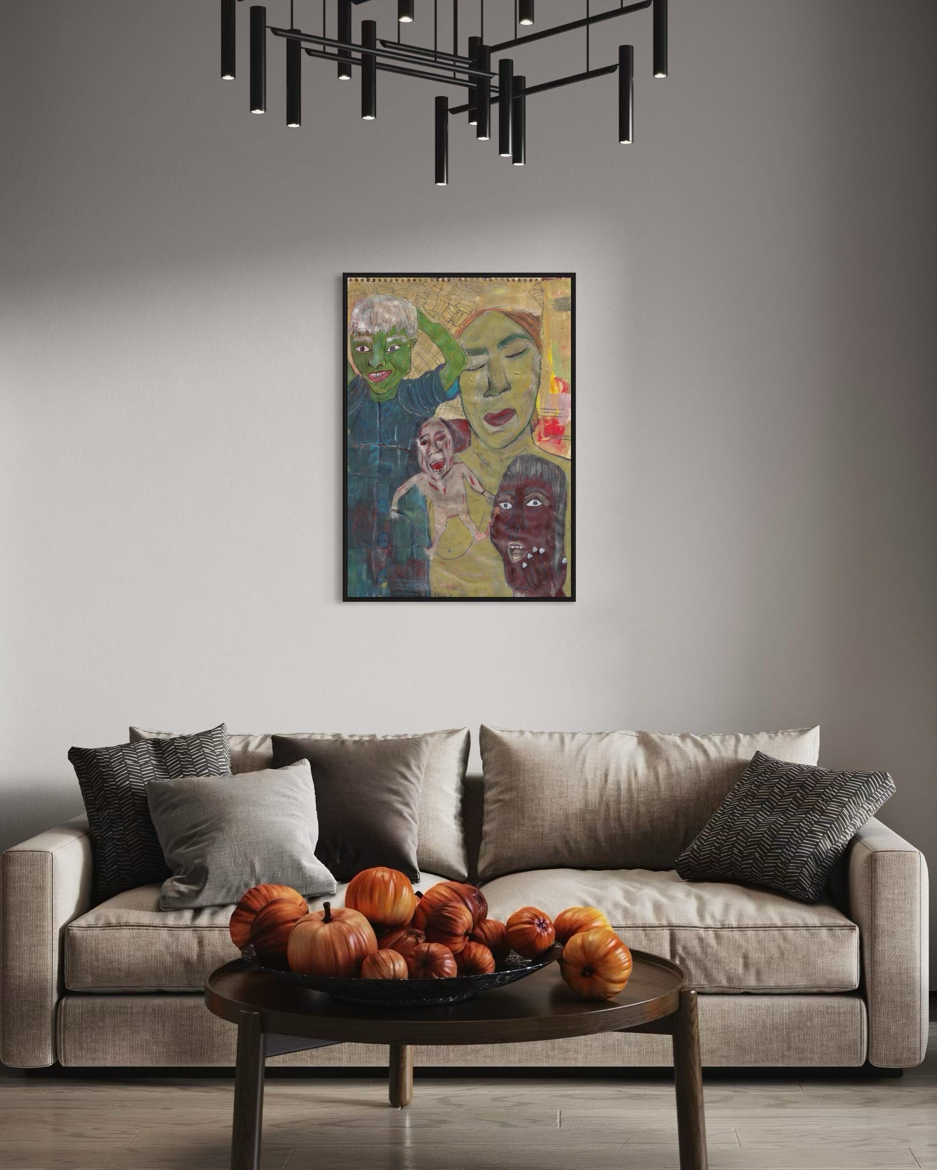 Living room with a gray sofa, decorative pillows, a coffee table with pumpkins, and a colorful abstract painting on the wall.