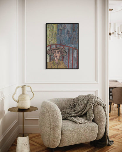 Modern living room with a textured armchair, side table, and wall art.