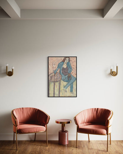 Two pink chairs with a small round table and a framed picture on a white wall.