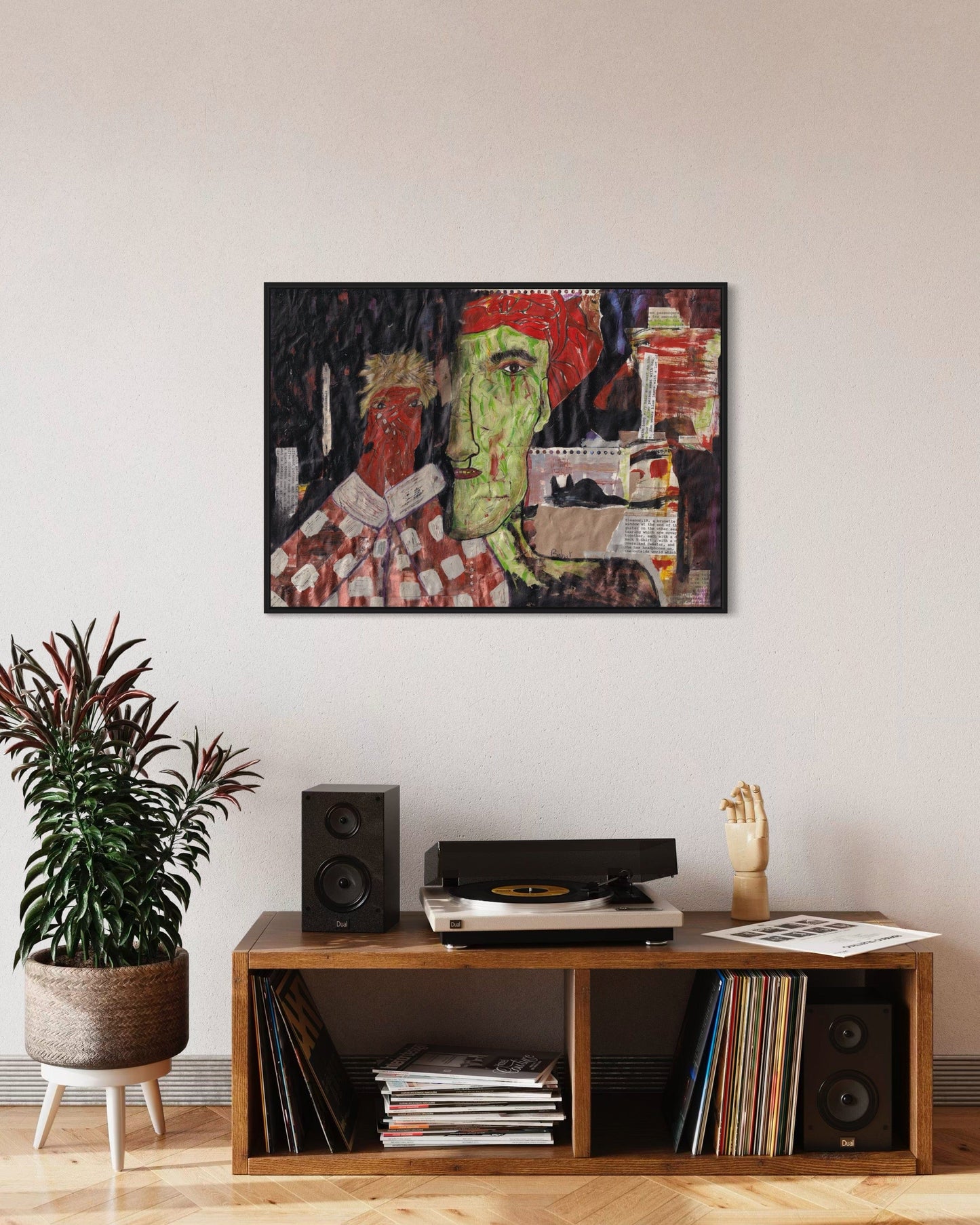 Living room with a wooden shelf, speakers, and a colorful abstract painting on the wall.
