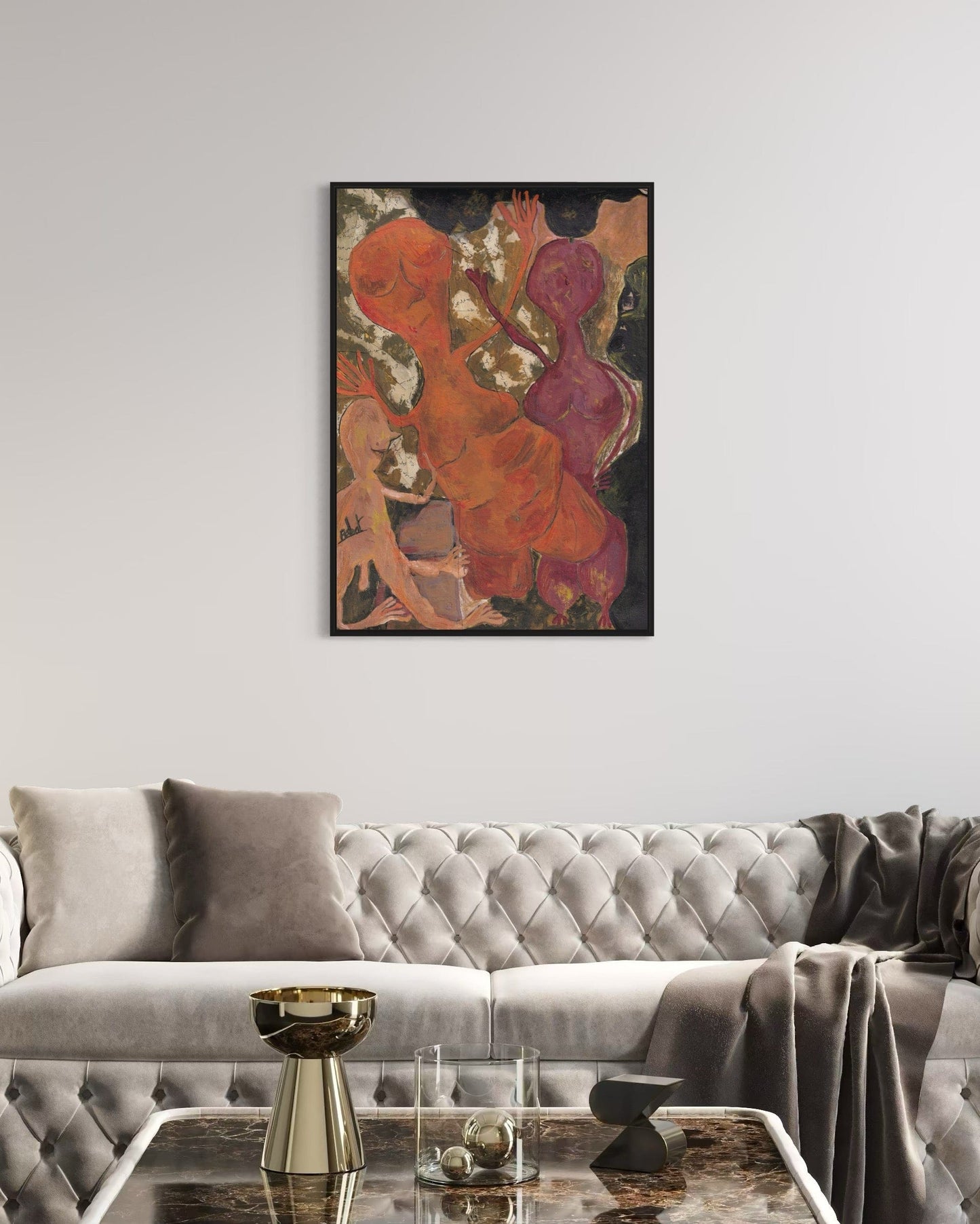 Abstract painting on a wall above a gray sofa in a living room.
