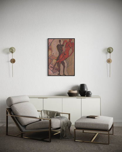 Modern living room with a gray armchair, ottoman, and wall art.
