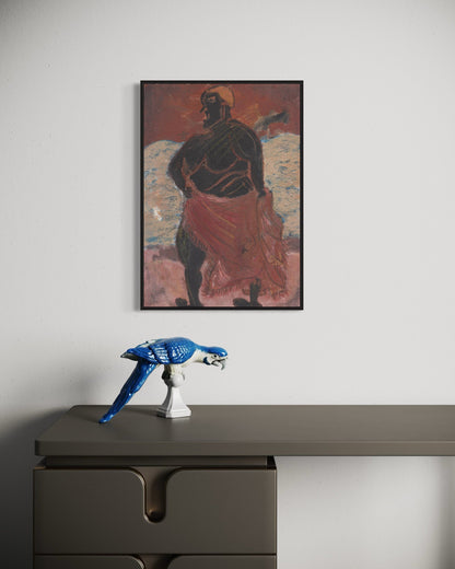 Framed artwork of a figure on a wall above a desk with a blue sculpture.