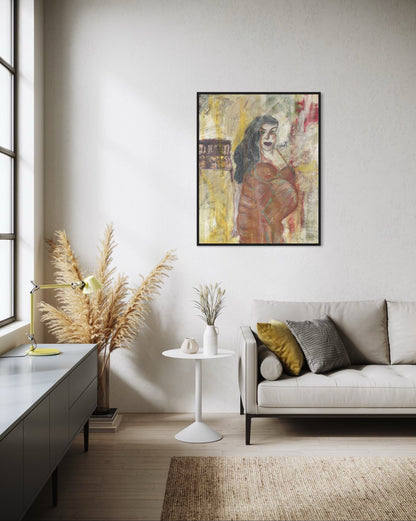 Modern living room with a framed artwork on the wall, a sofa, and decorative elements.