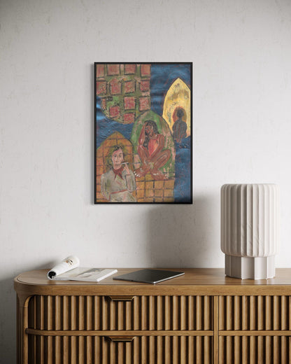 Framed artwork on a wall above a wooden console table with decorative items.