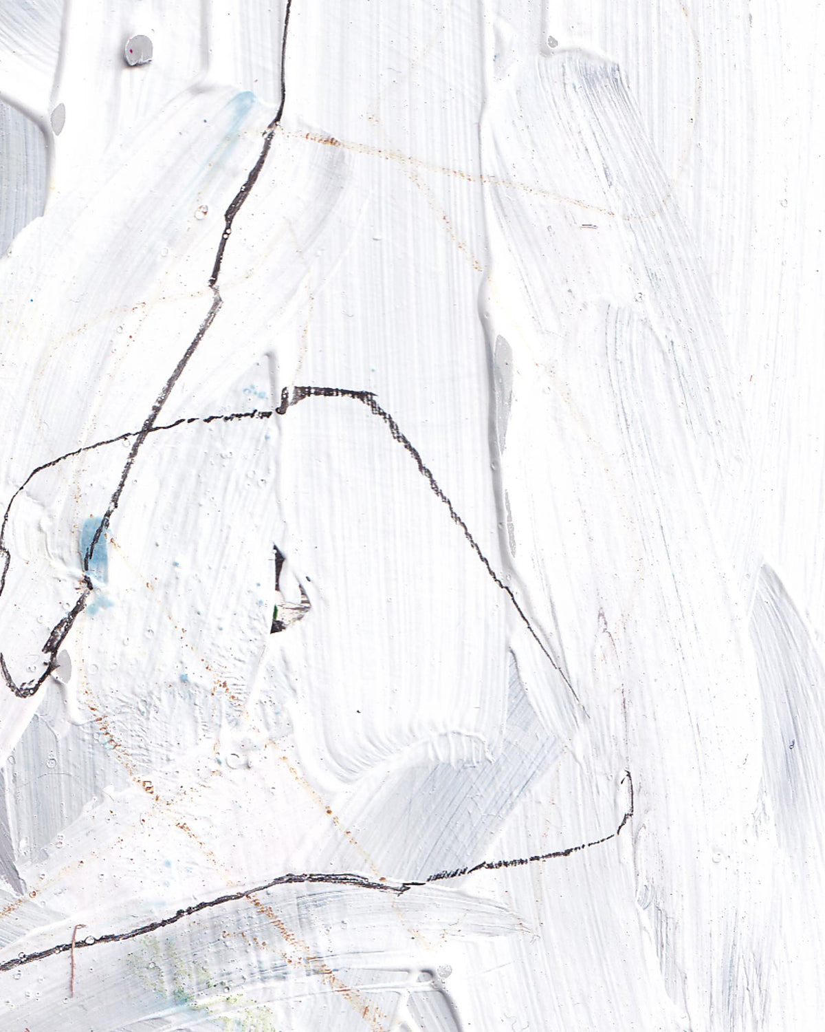 Close-up of a textured white surface with brush strokes and cracks.