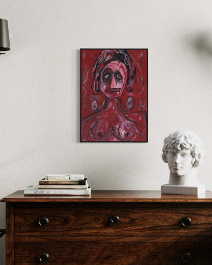 Artistic portrait on a wall above a wooden dresser with books and a sculpture.