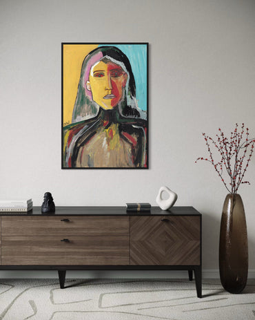 Abstract portrait painting on a wall above a wooden sideboard with decorative items.