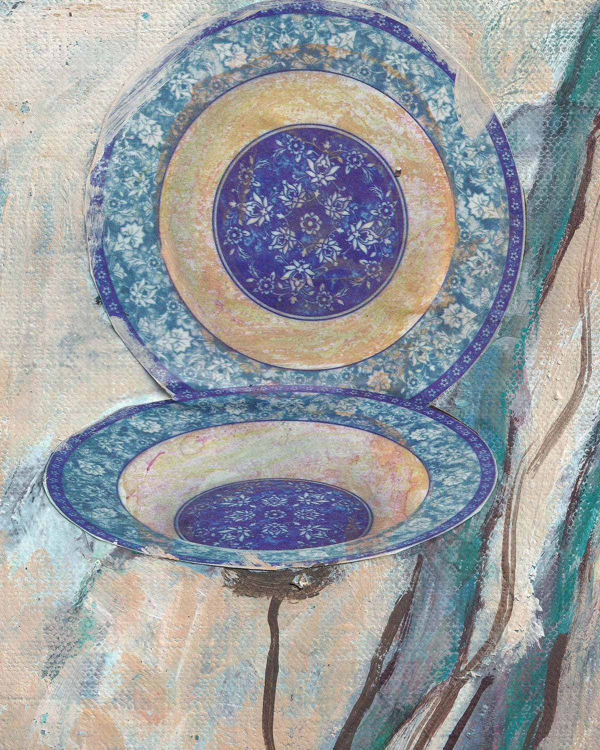 Decorative ceramic plates with blue and gold patterns on a textured background